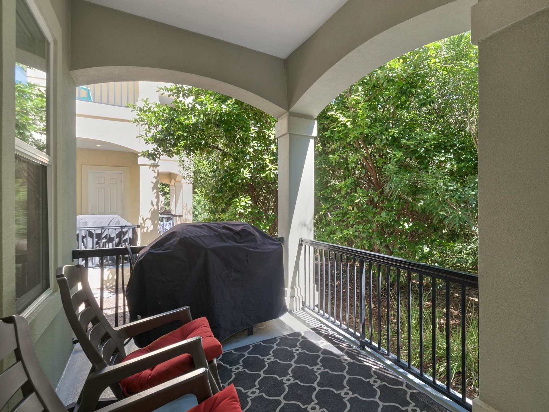 Back porch and grilling area off bedroom 1