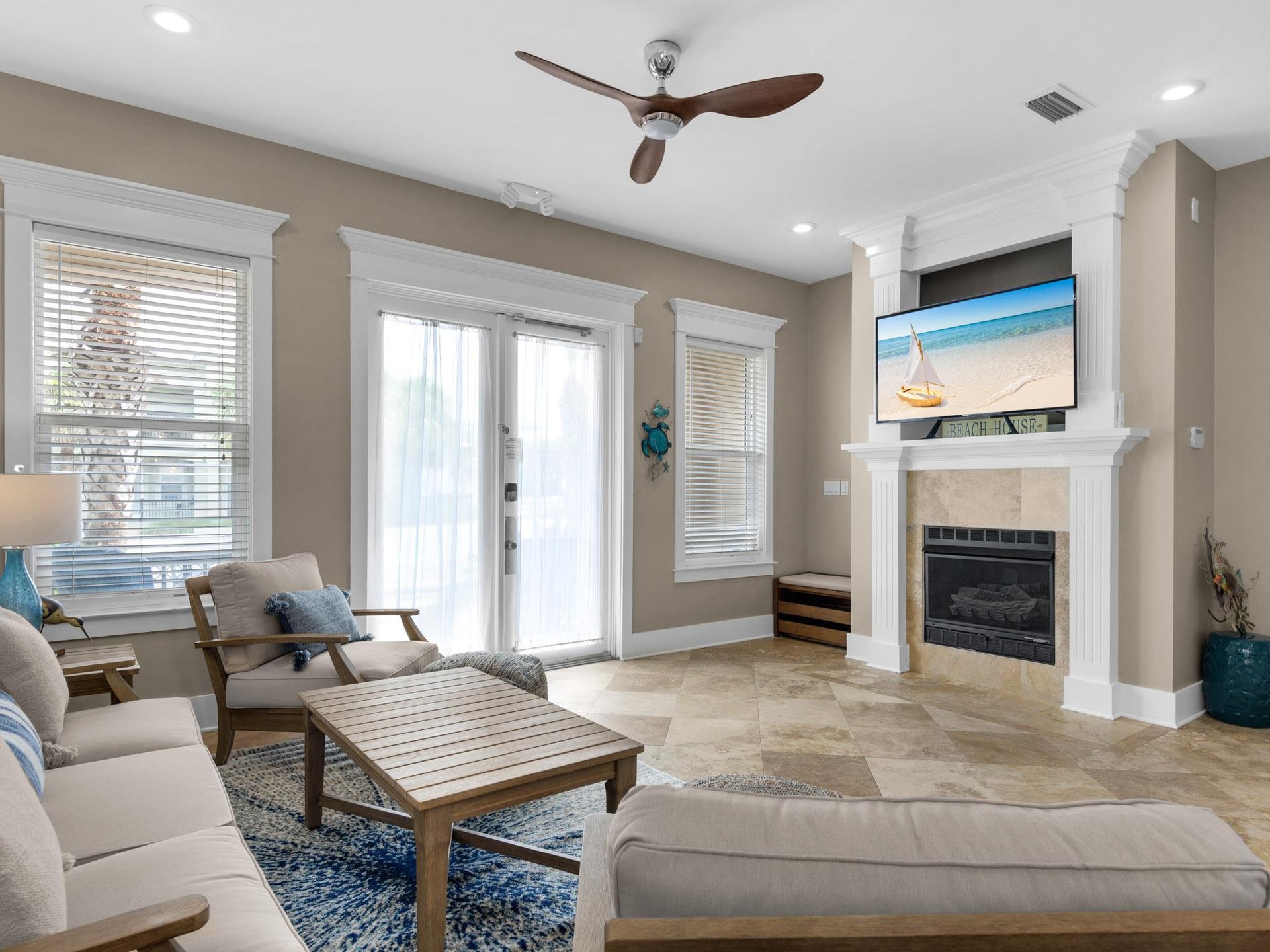 Living area with plenty of seating  decorative fireplace not operational