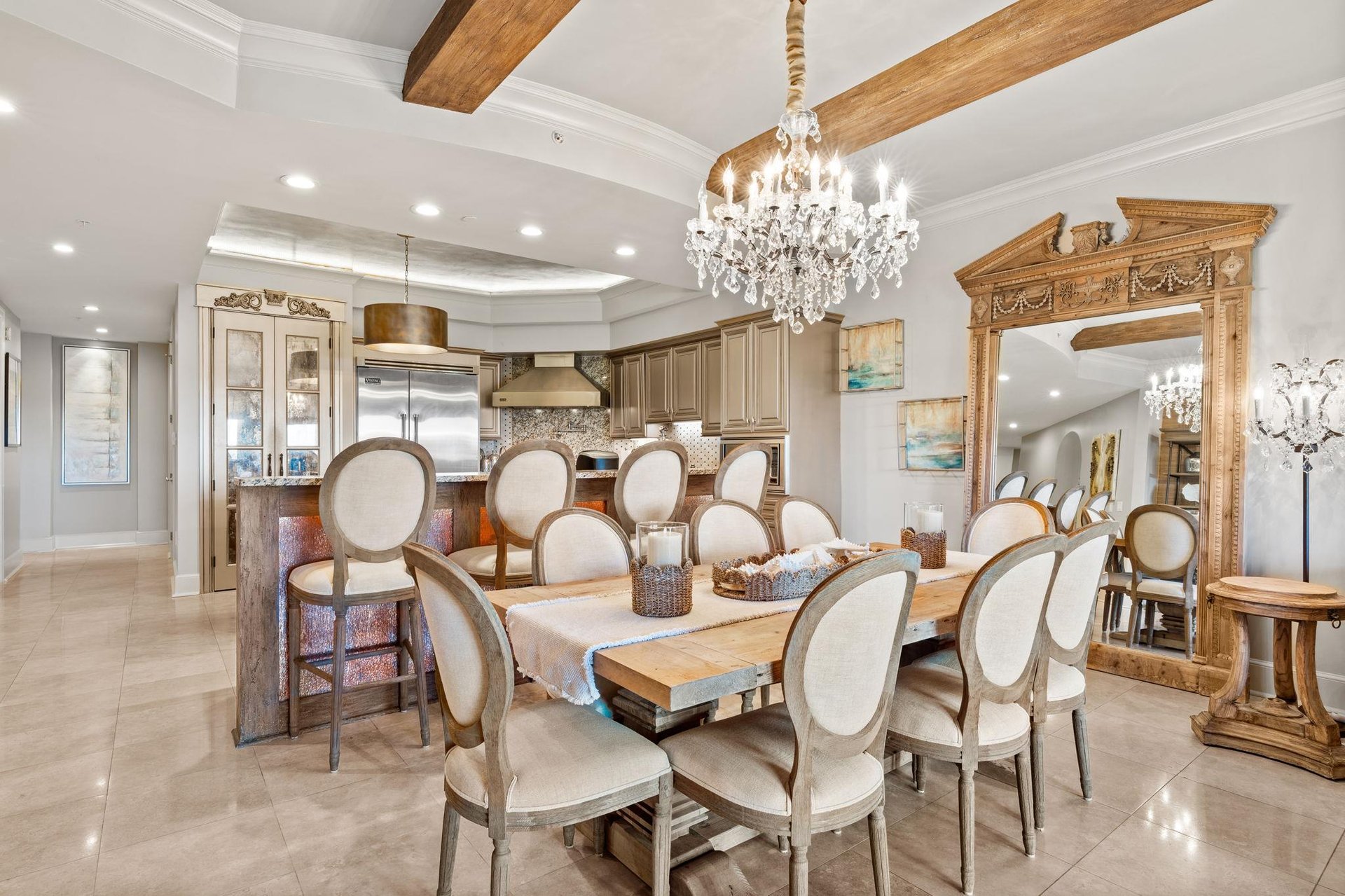 a dining room with a chandelier and a table