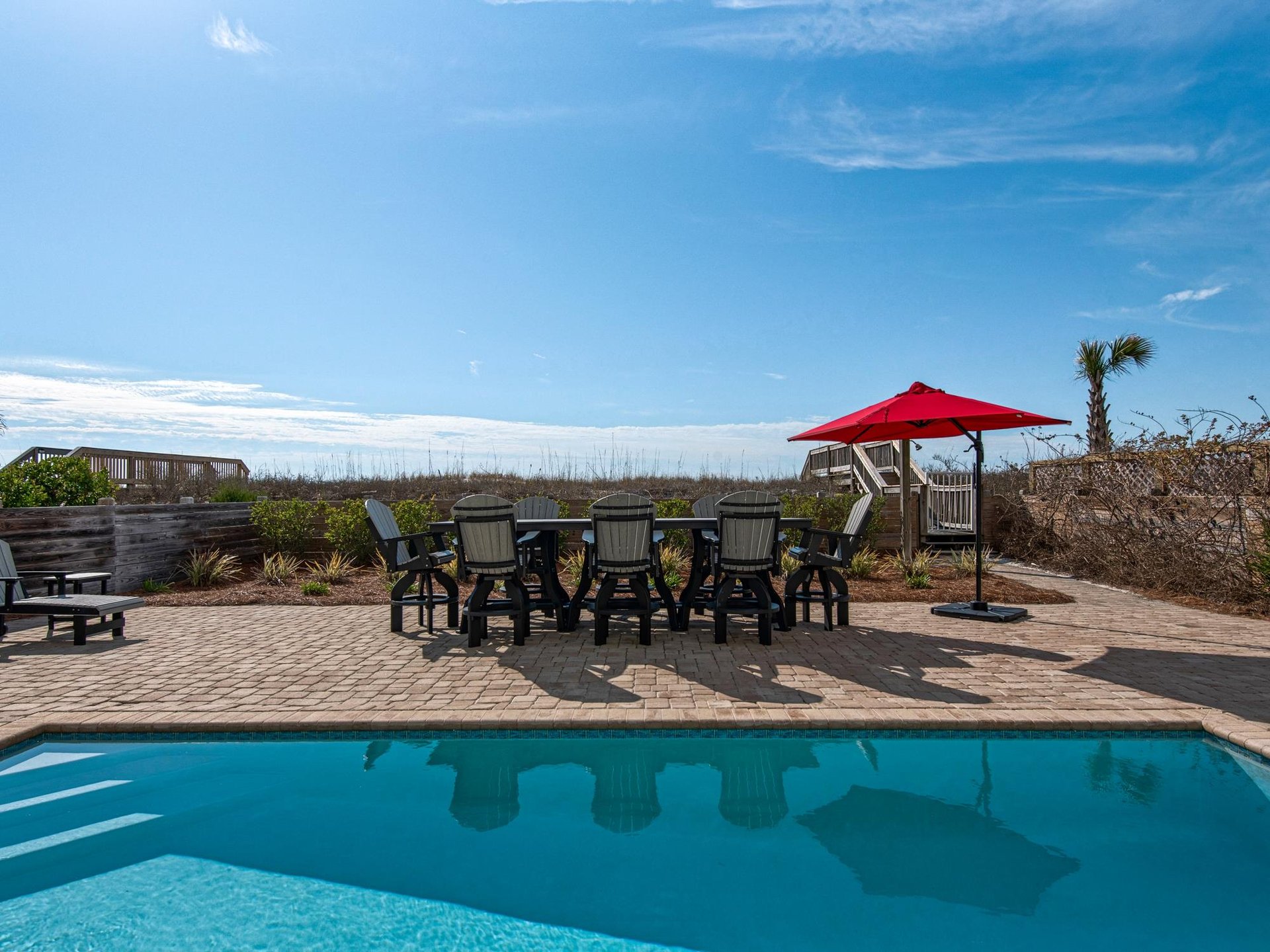Enjoy a Meal or a Game at Your Private Beach Front Pool