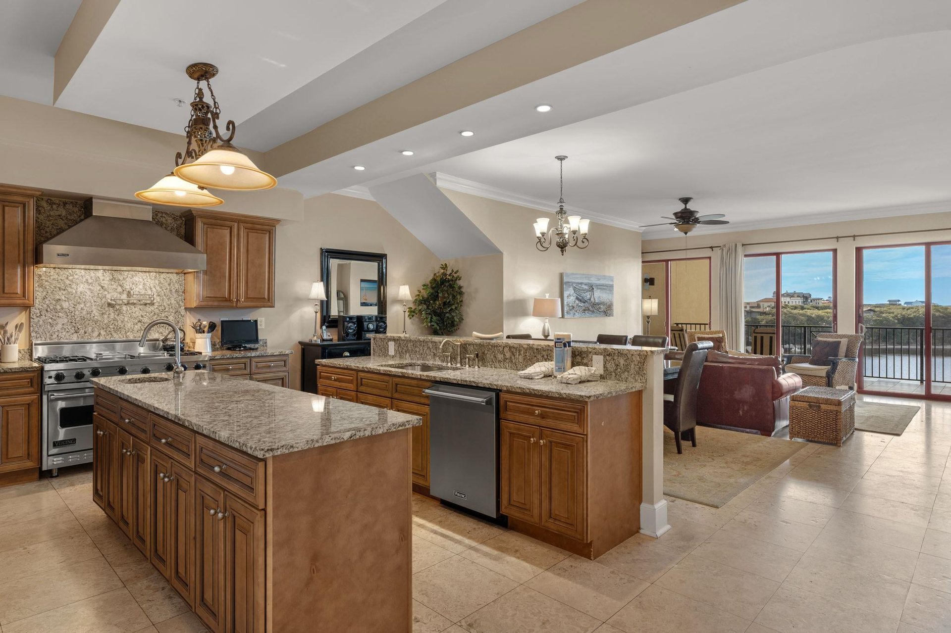 Your gourmet kitchen features granite countertops, premium appliances, and an open design that flows into the comfortable living space—perfect for entertaining.