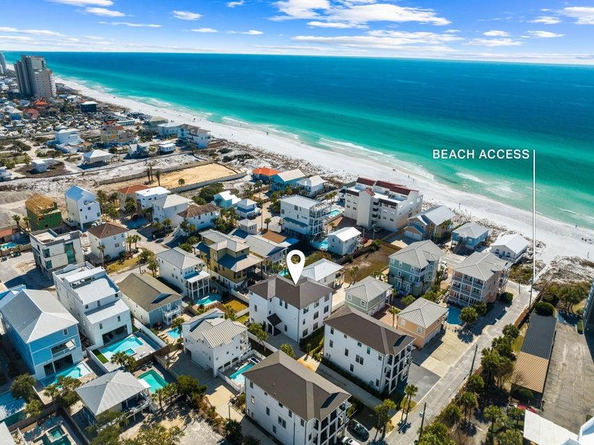 With the Beach access just steps away, you will have your toes in the sand in no time