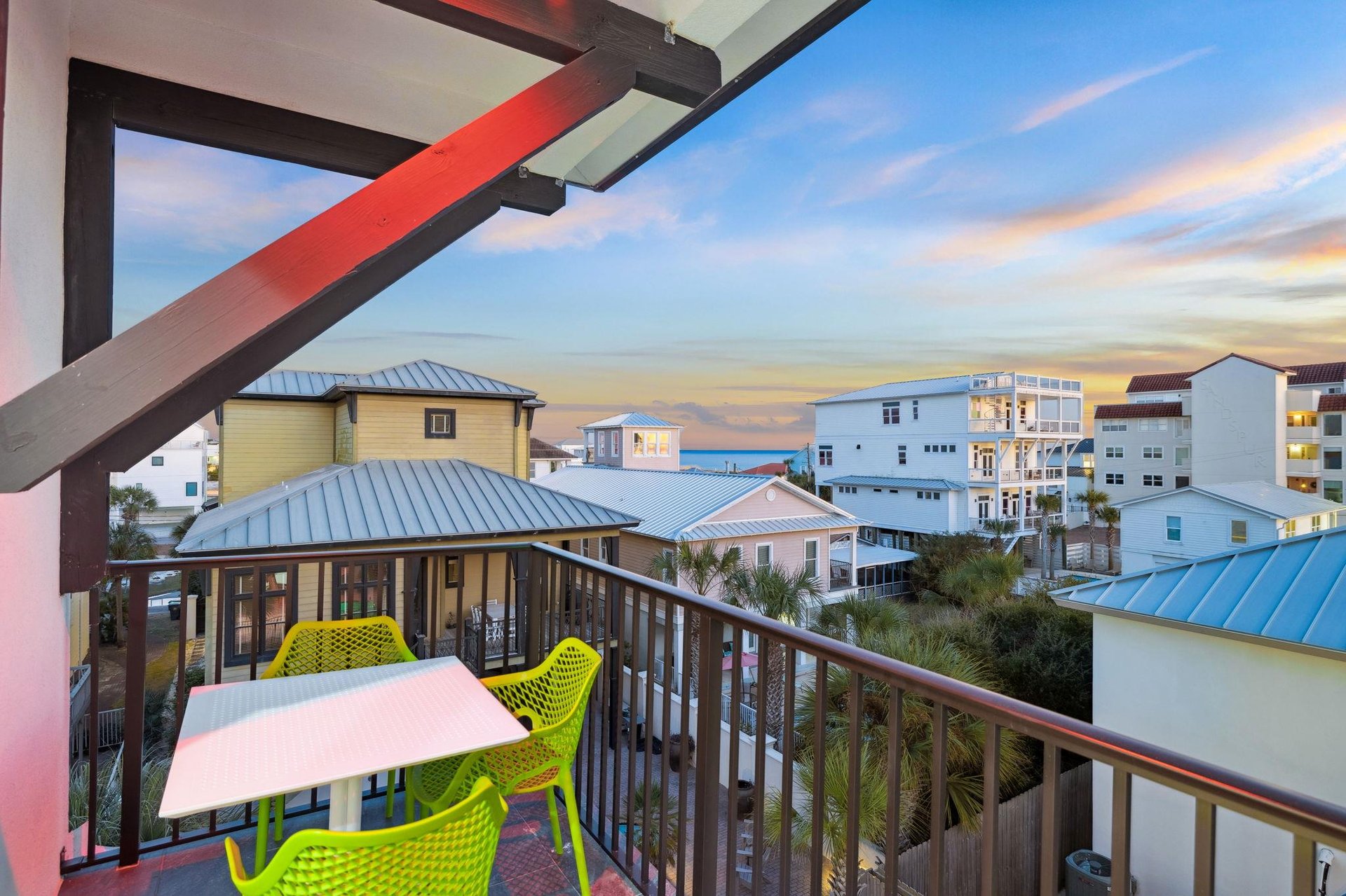 Sip your morning coffee on your private balcony while watching stunning sunrises paint the sky above this charming coastal neighborhood.
