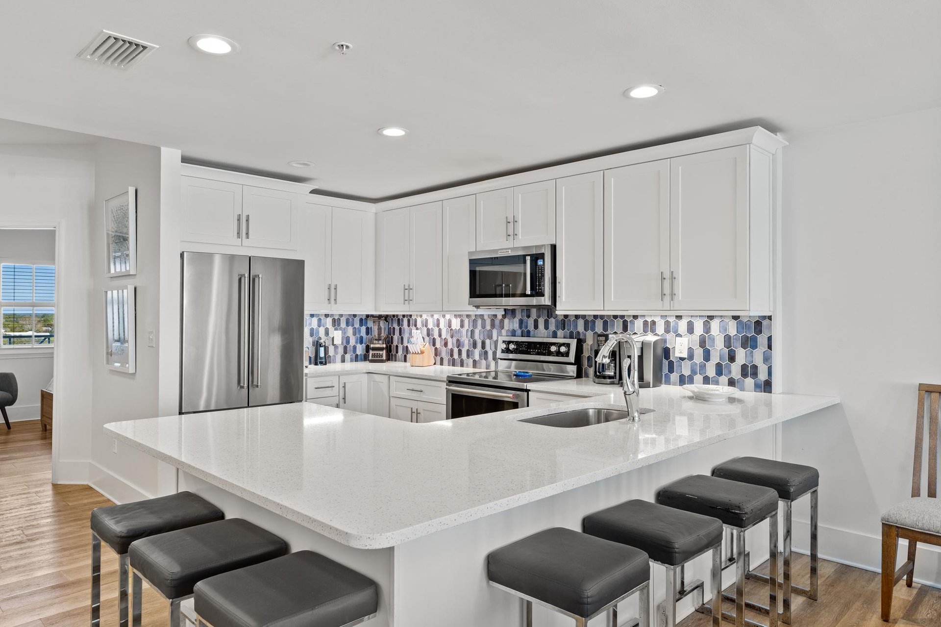 The oversized island is perfect for meal prep or dining.
