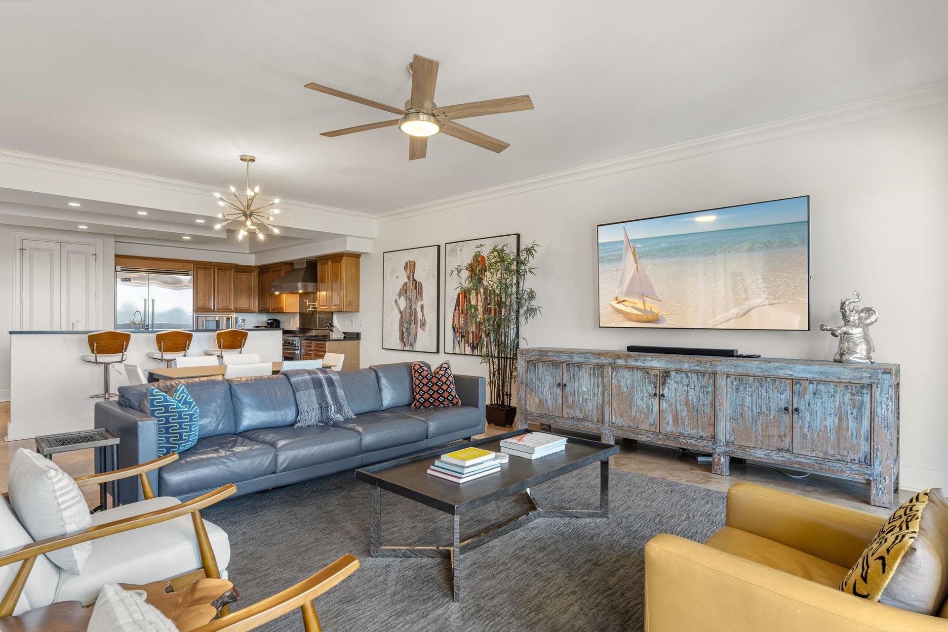 Sink into the plush leather sofa and enjoy your favorite movies on the large TV in this stylish living space.
