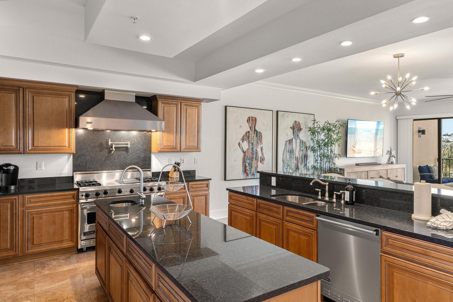 Chefinspired kitchen awaits with granite counters, stainless appliances, perfect for creating memorable meals together.