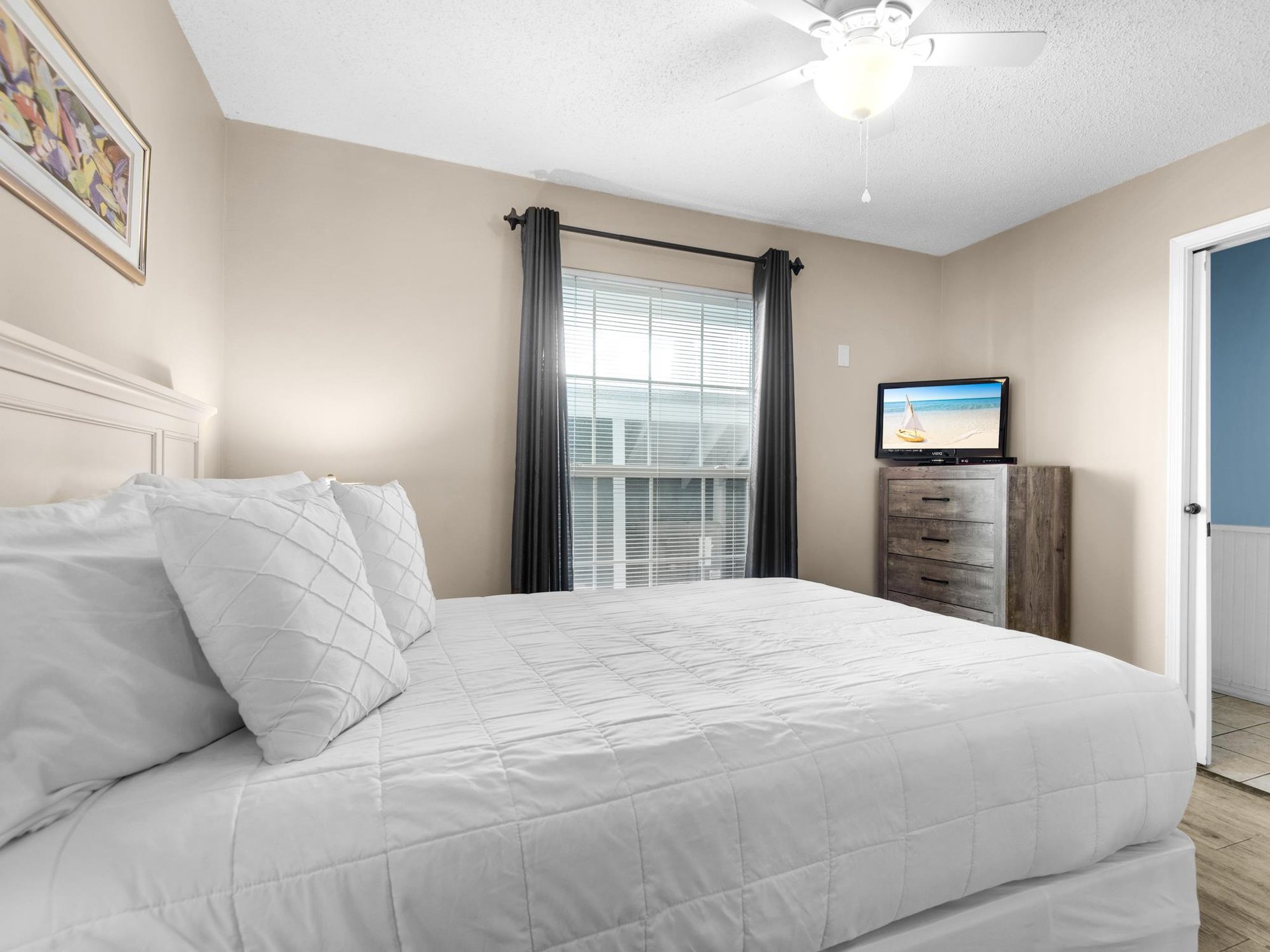 Bedroom 3  Drift off peacefully in your bedroom with neutral walls and coastal charm.