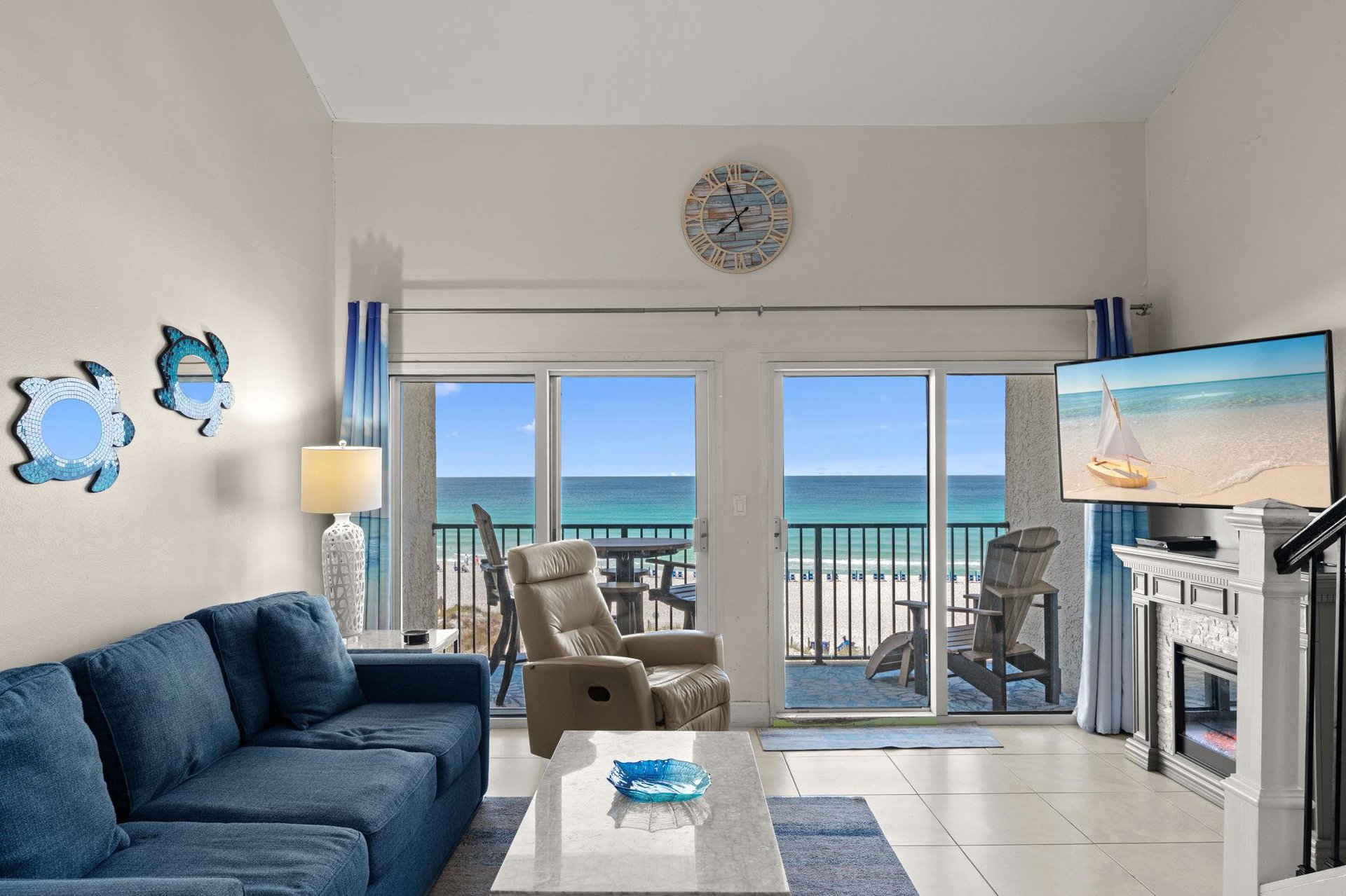 Your private sanctuary awaits with sweeping ocean views framing every moment. Relax in coastal comfort as turquoise waves greet you each morning through expansive balcony doors.