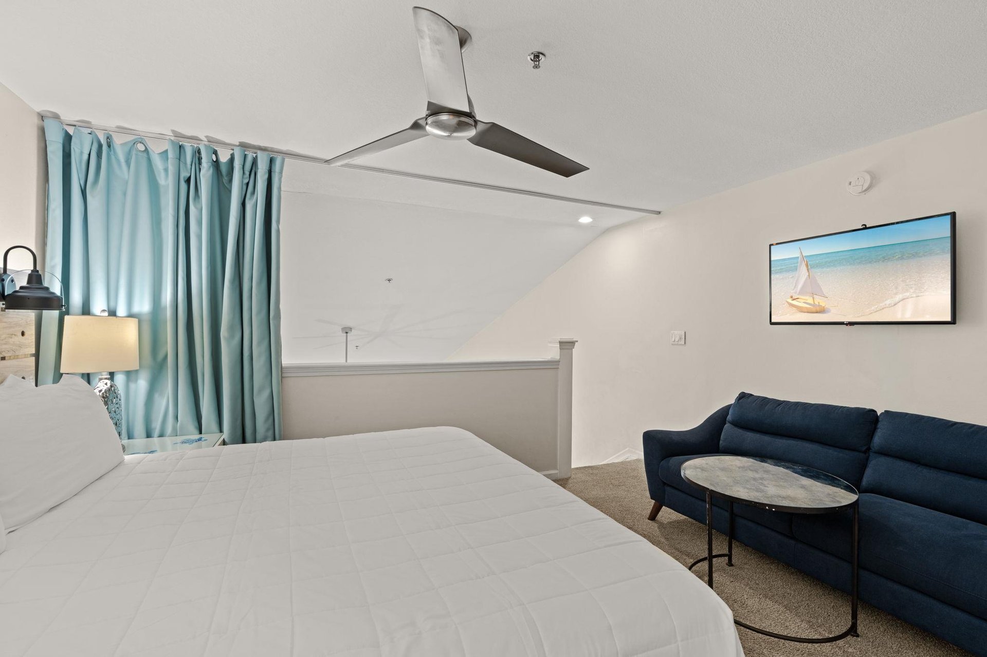2nd floor LOFT bedroom 2 with King bed  heavy custom curtain for privacy from living area below