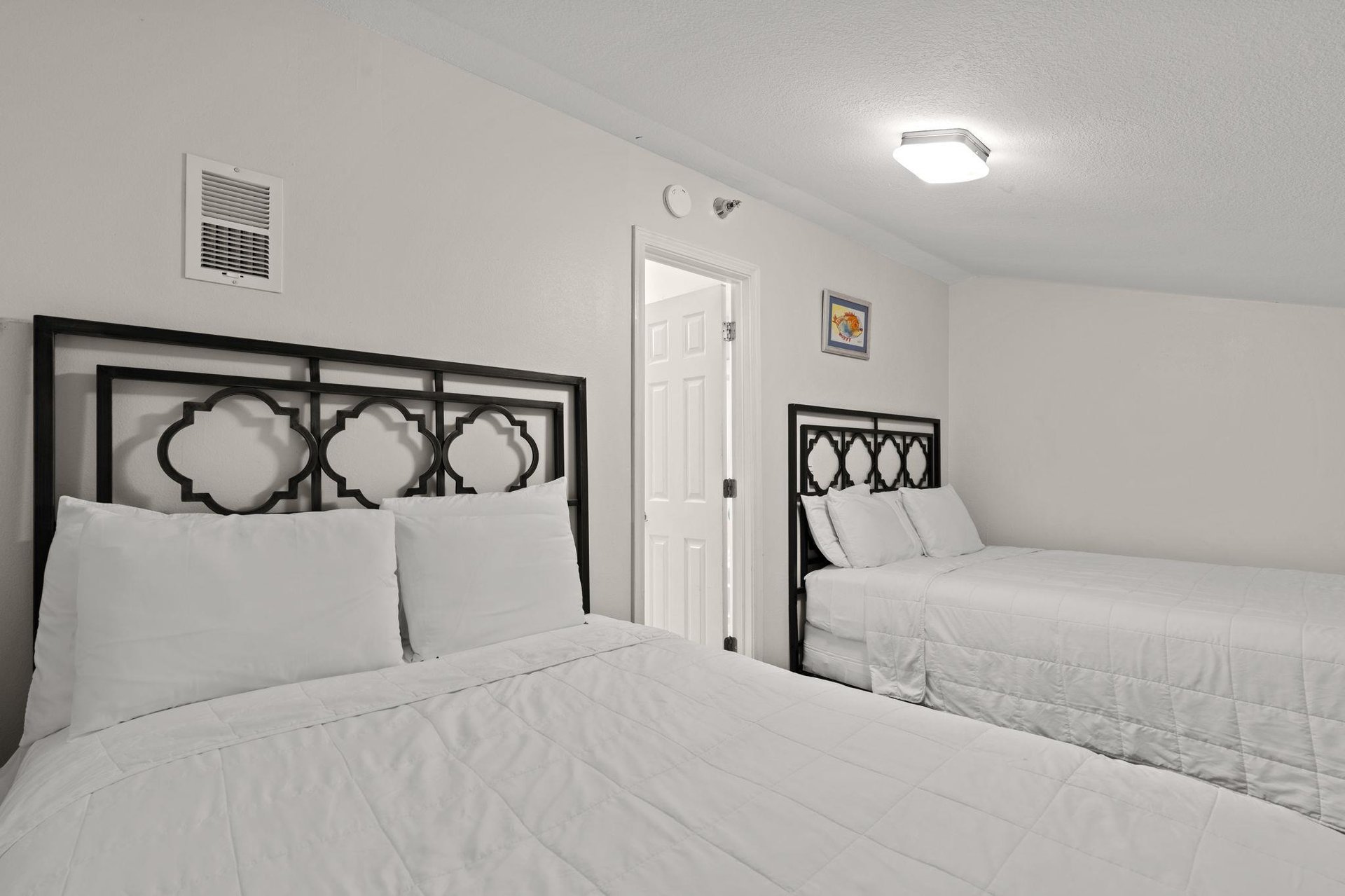 2nd floor LOFT bedroom 3 with queen and double bed with privacy door  walk thru king loft area to access this room
