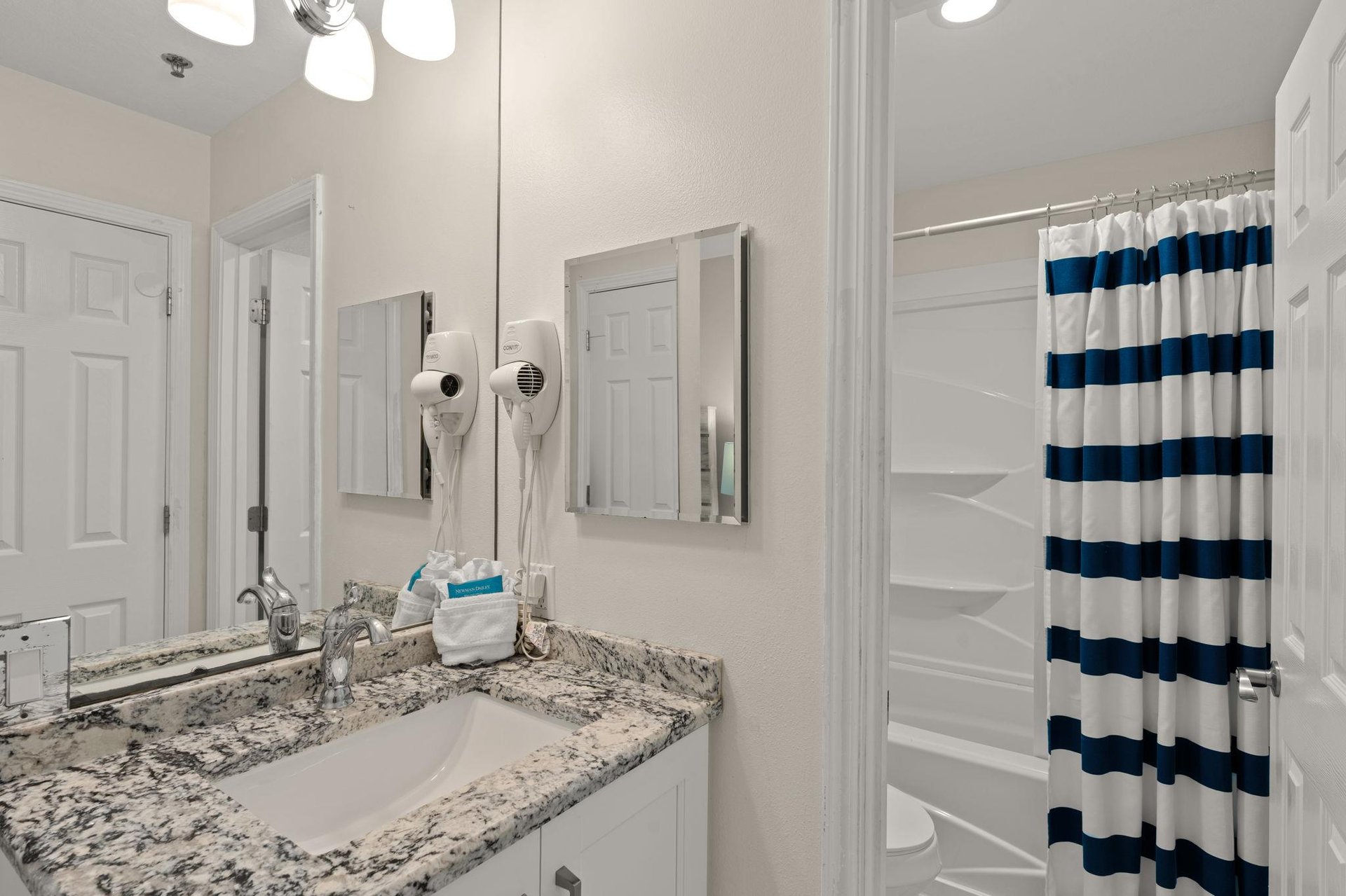 2nd floor LOFT shared bathroom with open vanity area, door for privacy in shower and toilet room