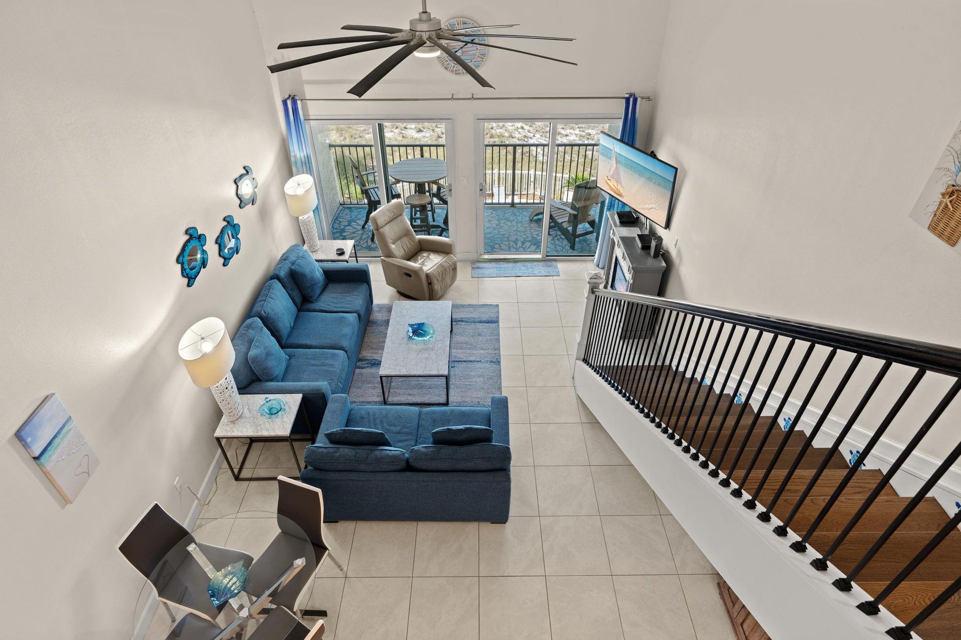 Enjoy your coastal escape from this airy, twostory condo with 2nd floor open loft room and additional bedroom in shared loft space.