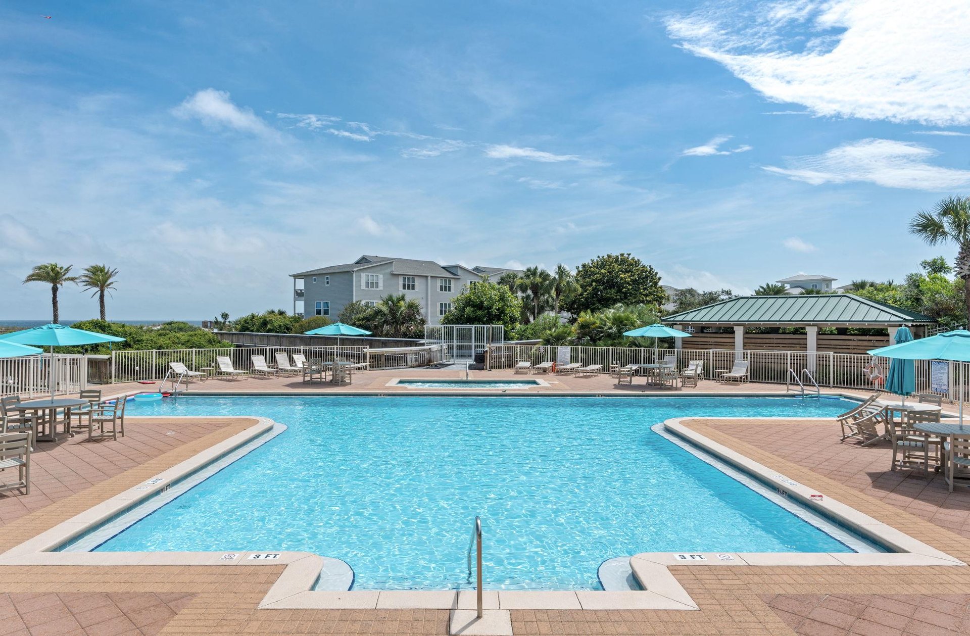 Dive into crystalclear waters surrounded by swaying palms and coastal breezes. Lounge poolside under bright turquoise umbrellas, soak up the sun, and let your worries drift away in this serene oasis.