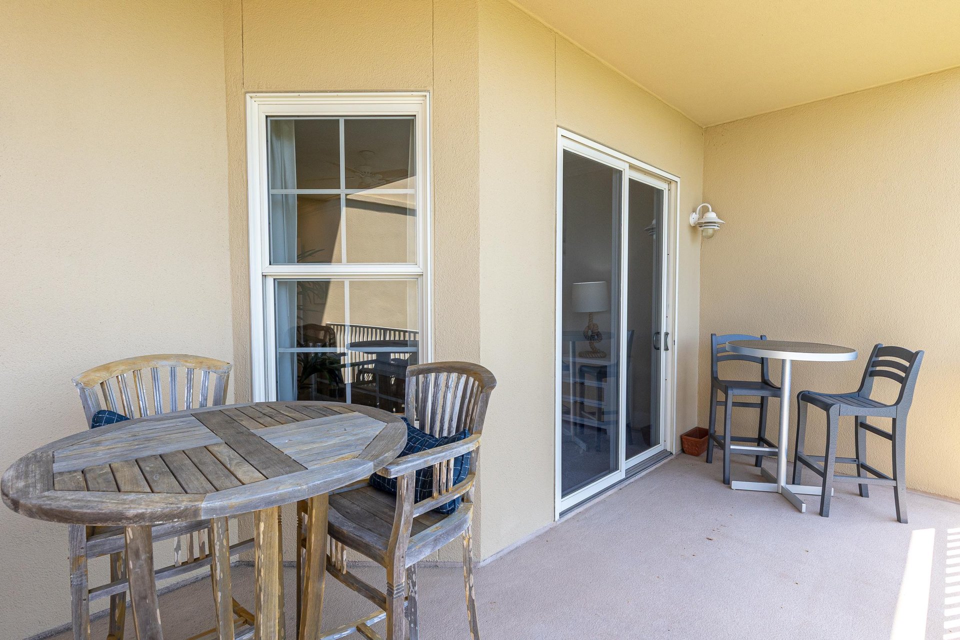 Step onto your private covered balcony where two seating areas invite you to savor morning coffee or evening conversations in the fresh air.