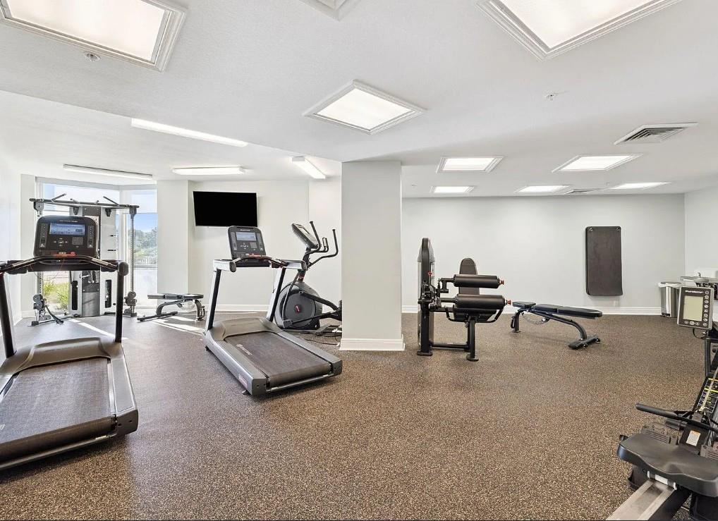 Stay active in your bright, wellequipped fitness center with cardio machines, strength training equipment, and skylights flooding the space with natural light for your energizing workout.