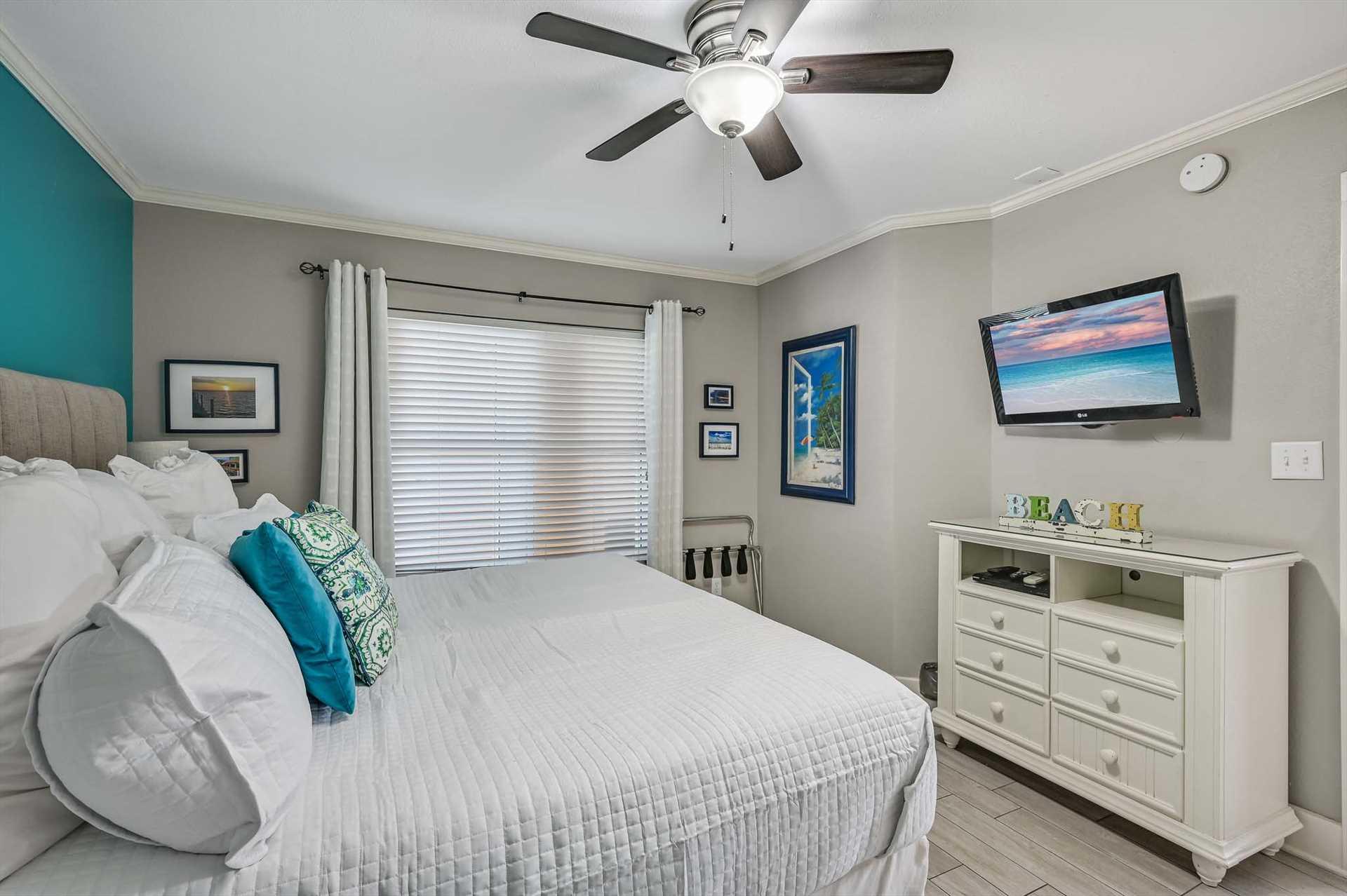 Unwind in your serene bedroom retreat, where soft linens and calming coastal hues invite you to rest and recharge after a day of adventure.