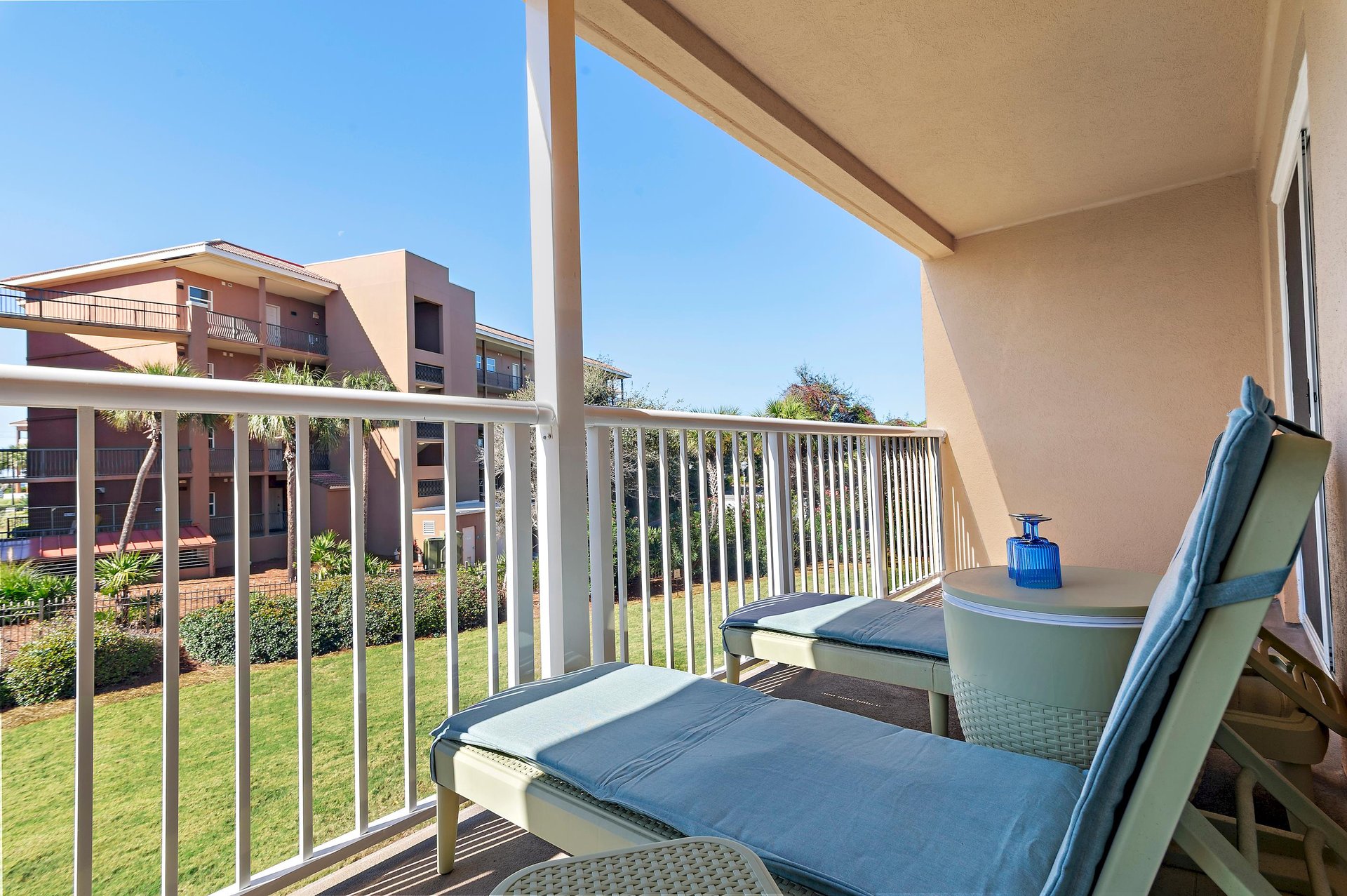 Step onto your private balcony and sink into a plush lounger, perfect for soaking up the sun or enjoying your morning coffee.