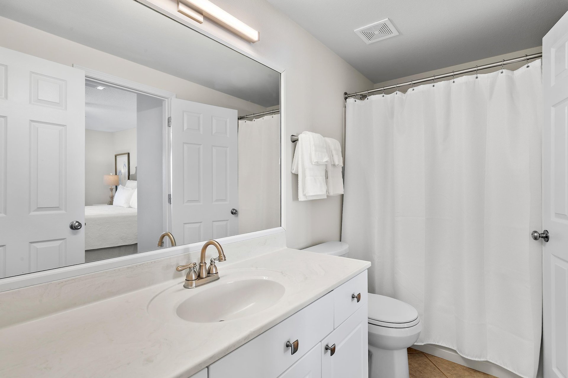 Freshen up in your clean, welllit Guest Bathroom, complete with fresh towels and a spacious vanity to prep for the day.