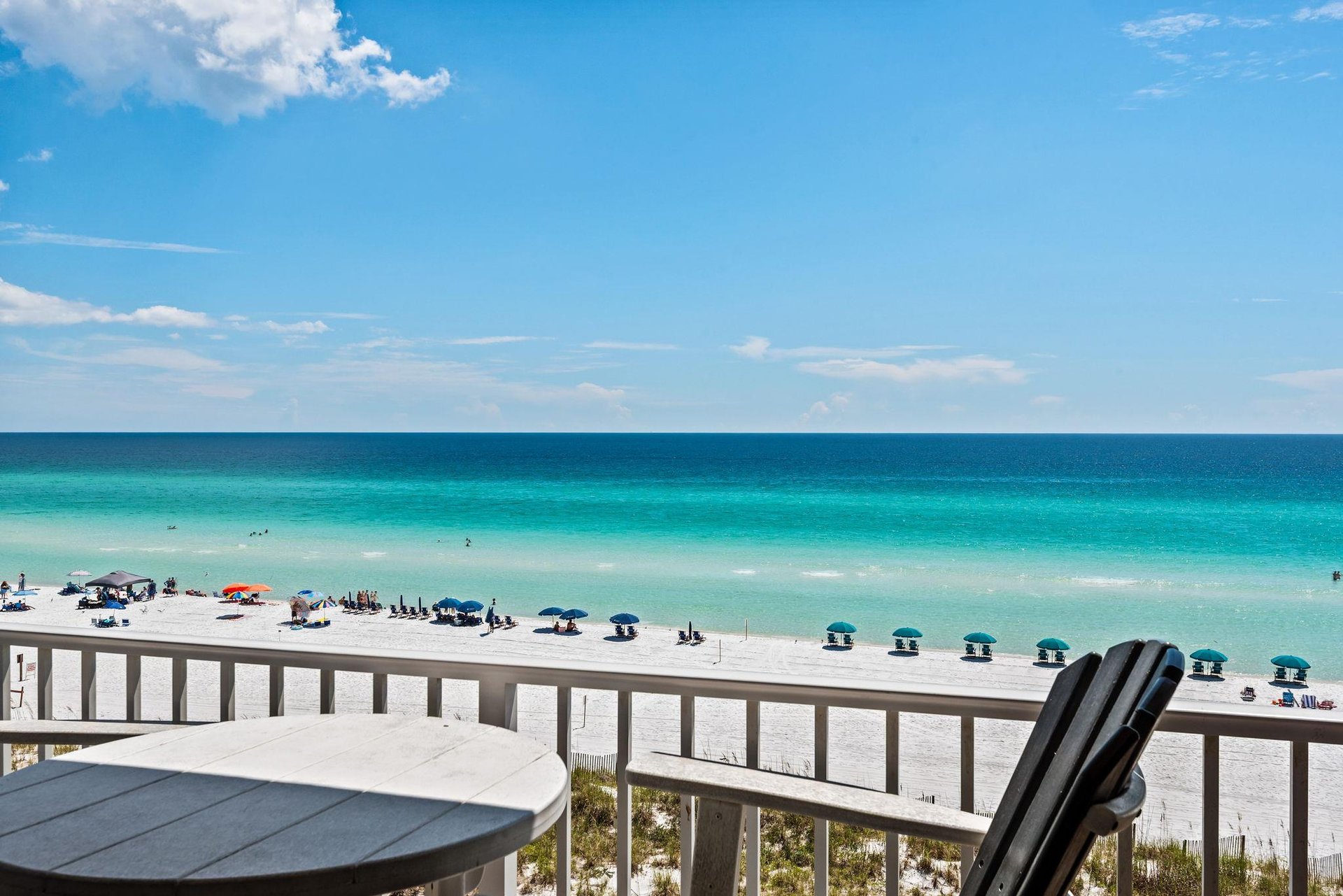 Breathtaking beachfront views with powdery white sand and turquoise waters stretching endlessly before you.