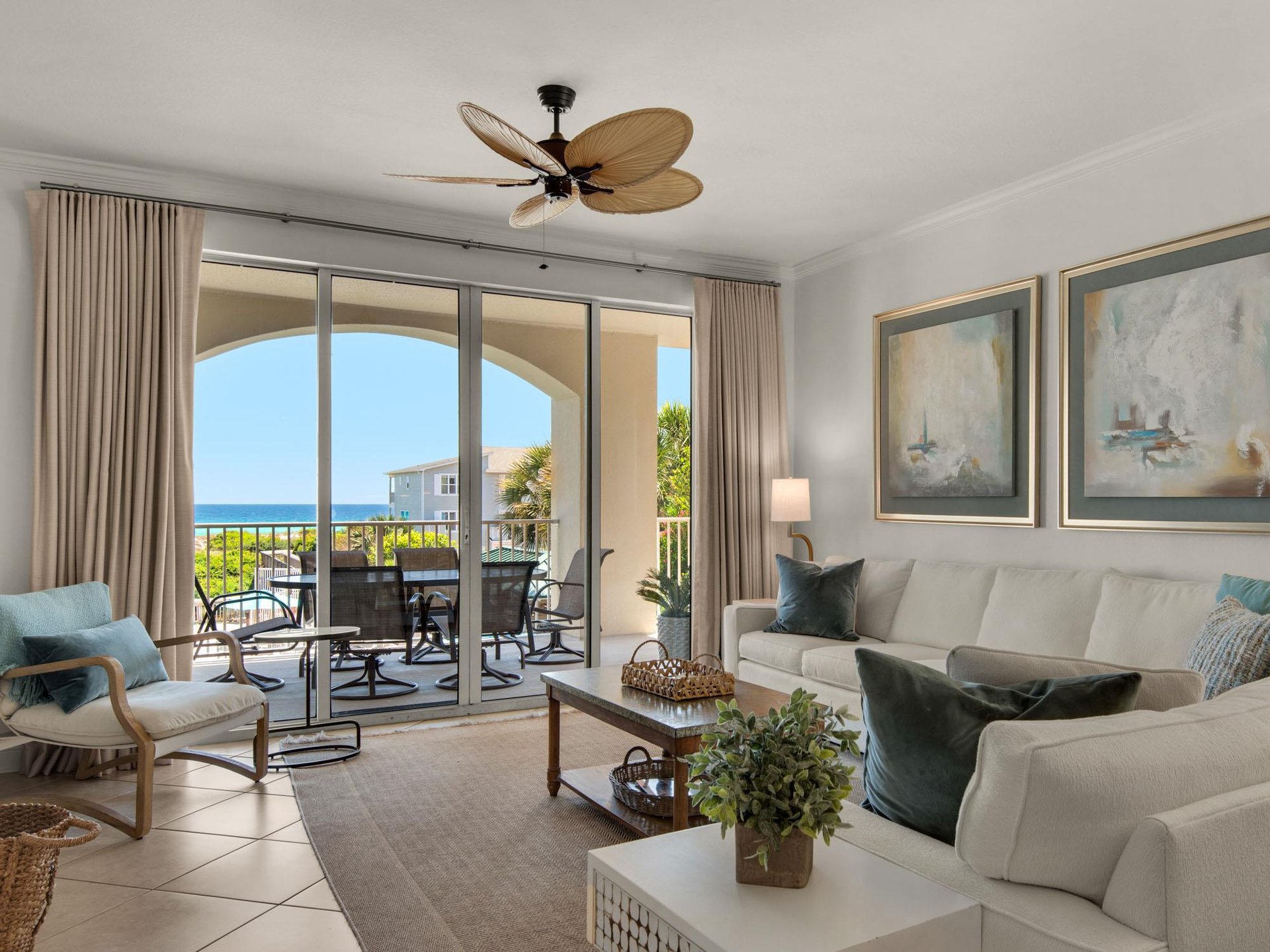 Living area with balcony access and Gulf views