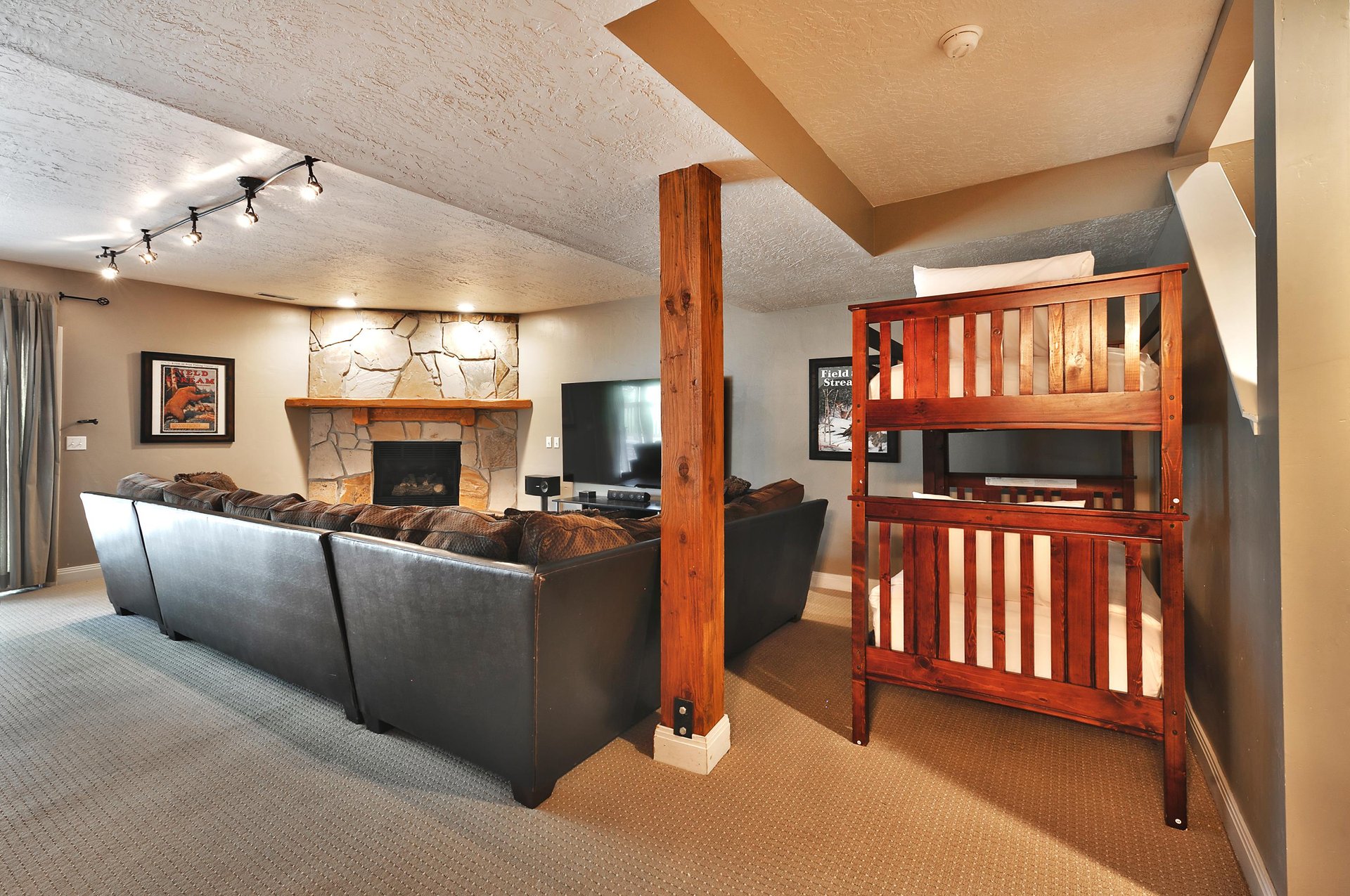 Wood frame twin bunk beds in the den