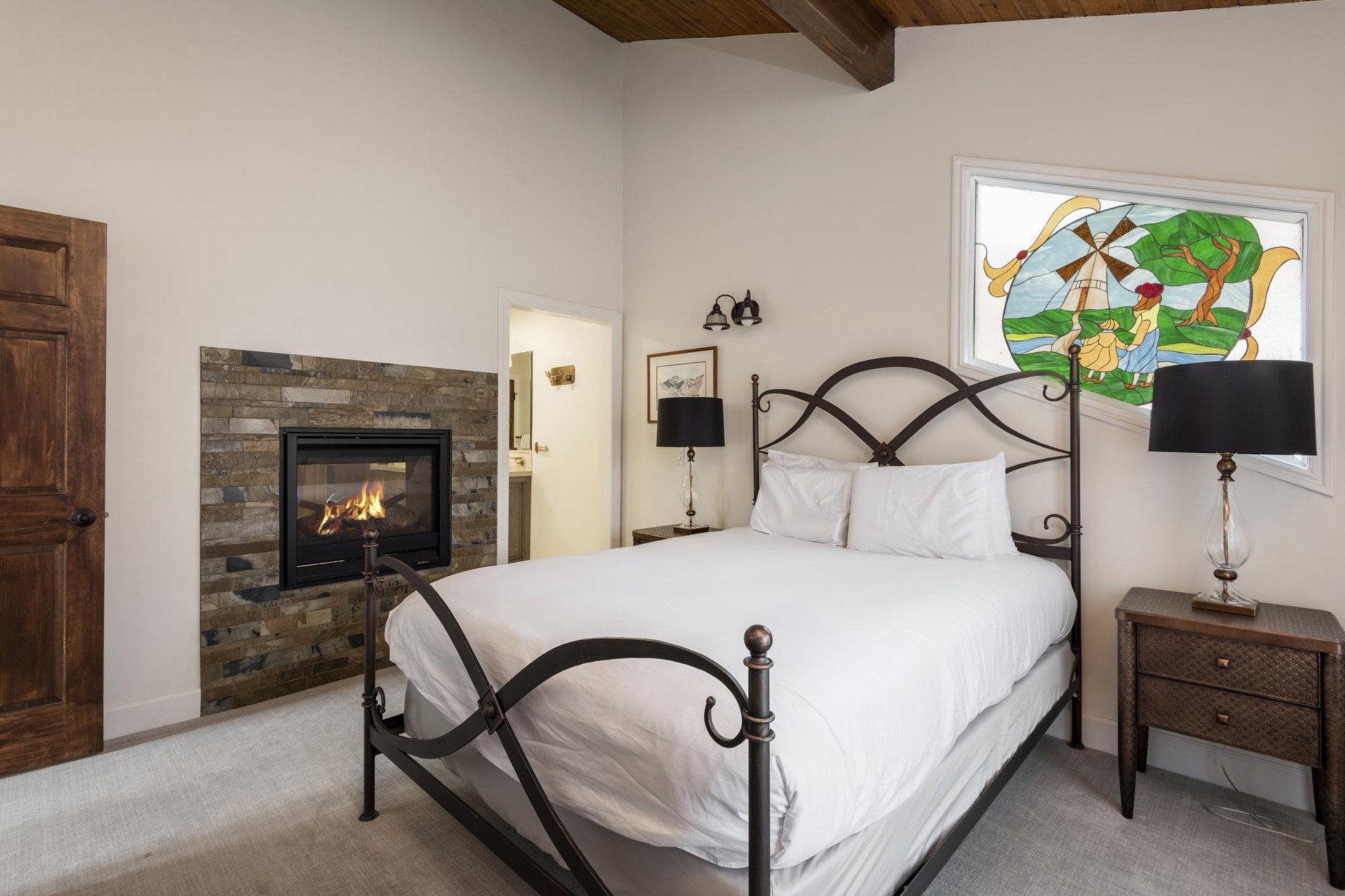 Main bedroom with stained glass accents