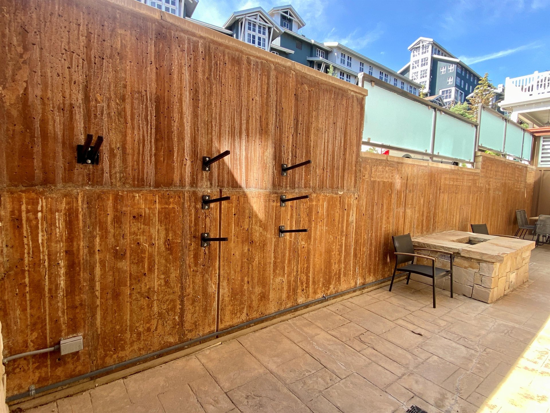 Convenient ski and snowboard racks on the private patio for secure gear storage