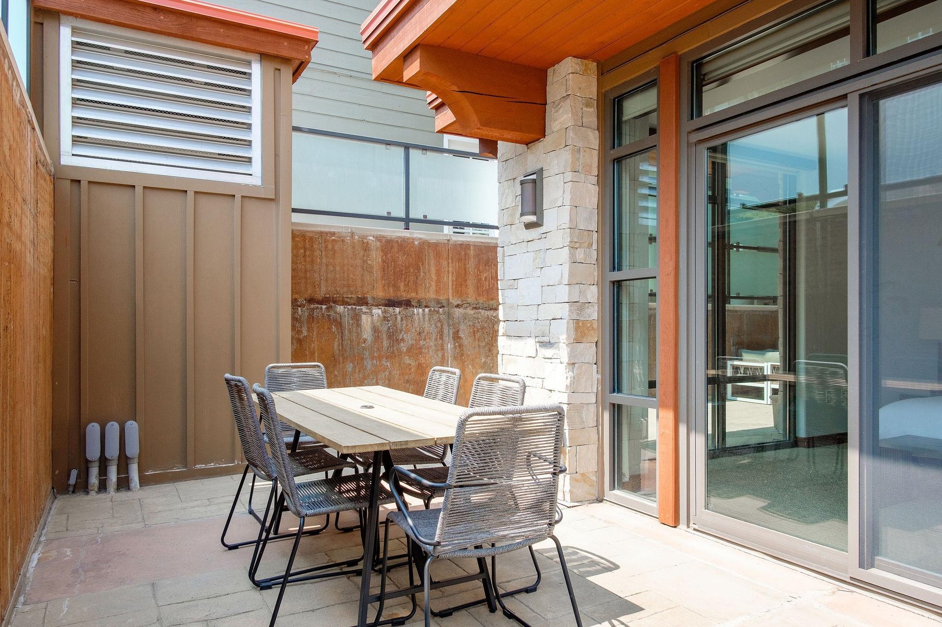 Seating for 6 at the outdoor wooden patio table
