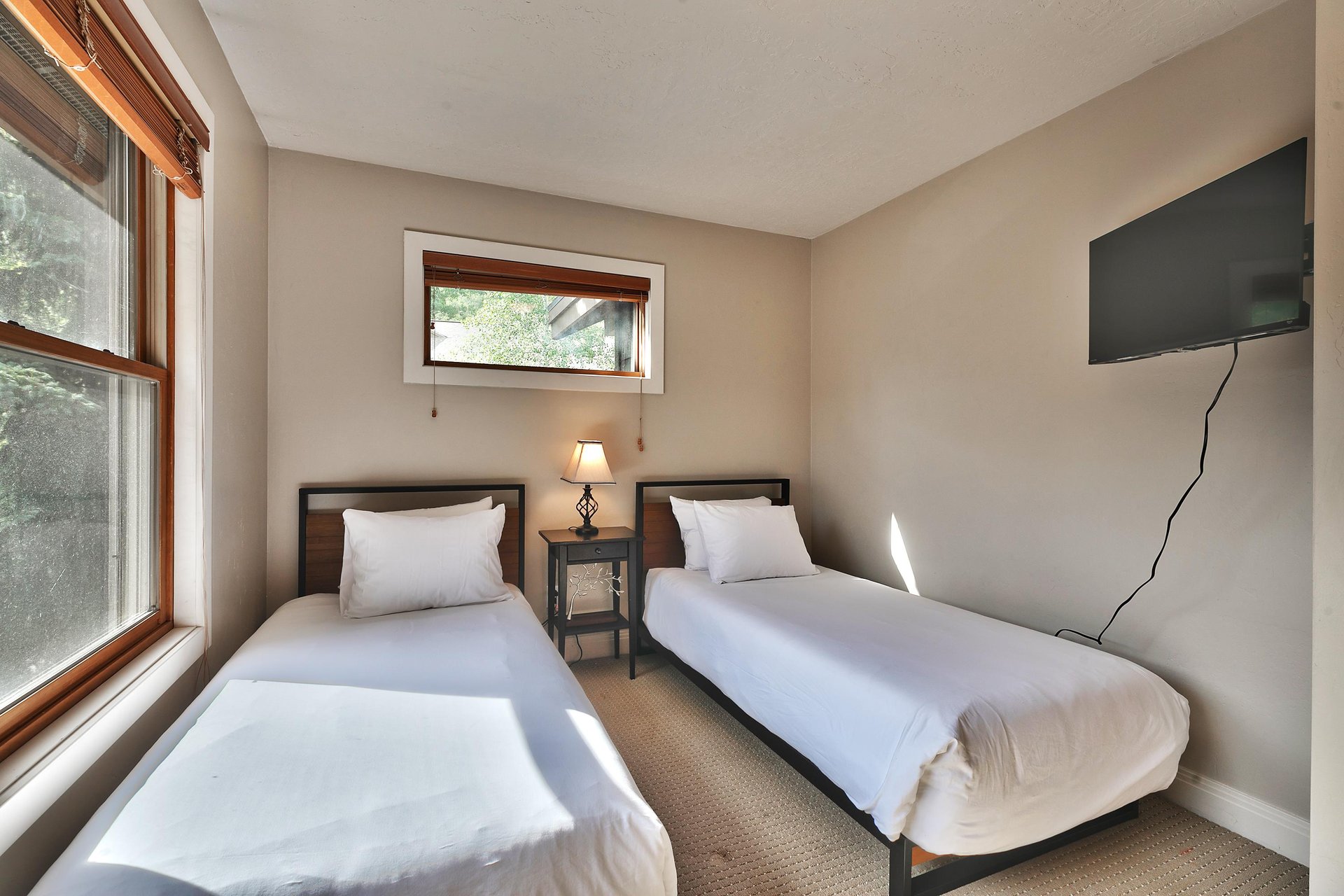 Twin beds can be made into a king bed with advanced notice, wall mounted flat screen TV