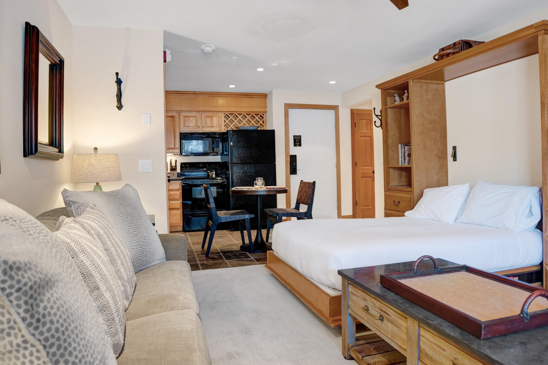 The living room with a queen murphy bed