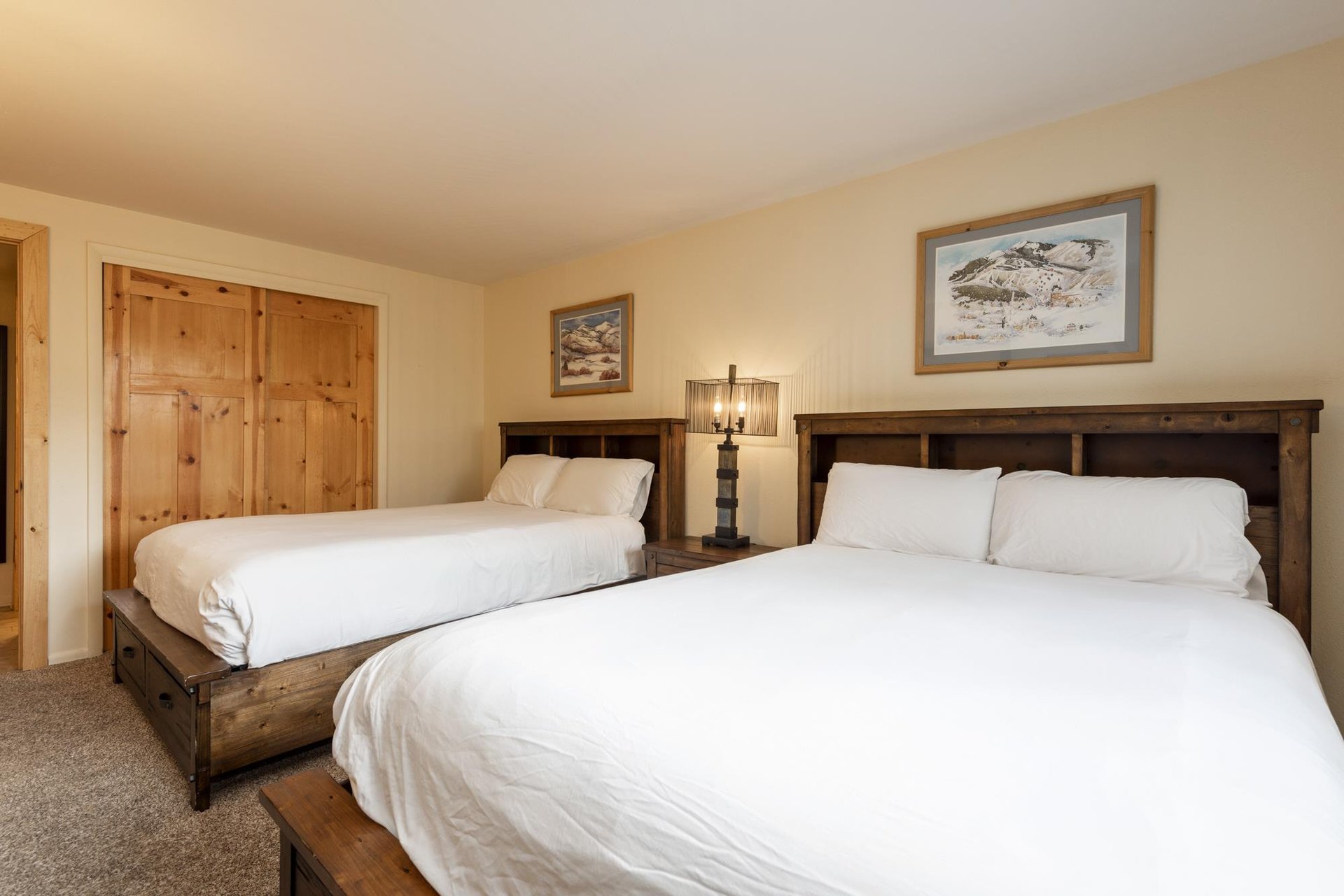 Queensized beds in the guest bedroom