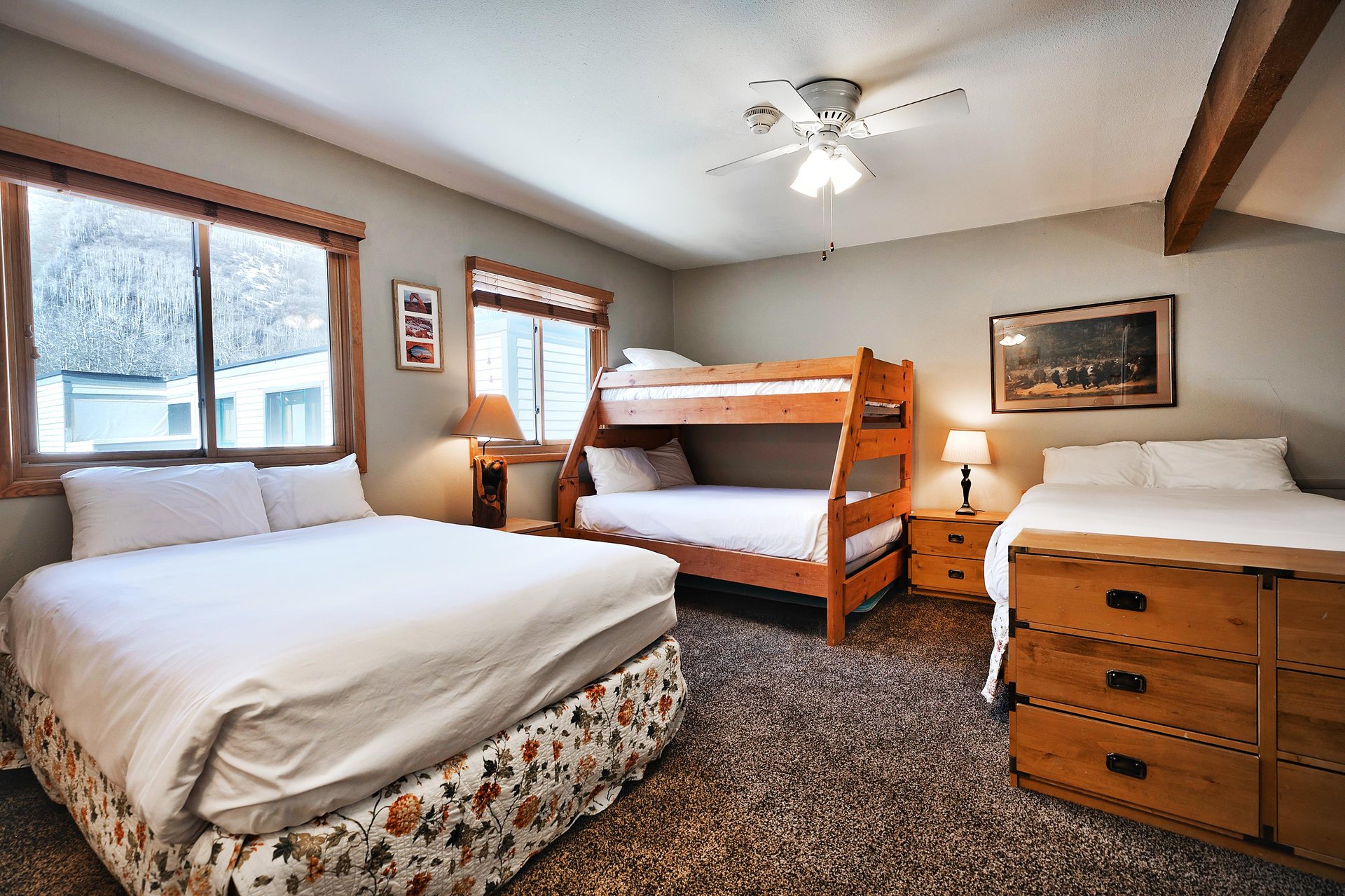 The loft features two doublesized beds and a twindouble bunk bed, all made with crisp white linens