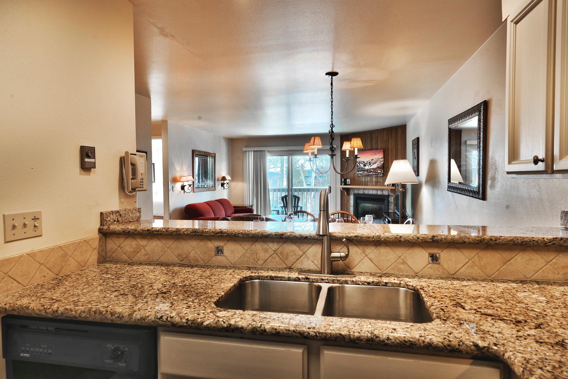 The kitchen opens into the dining area and living room to keep the conversation flowing