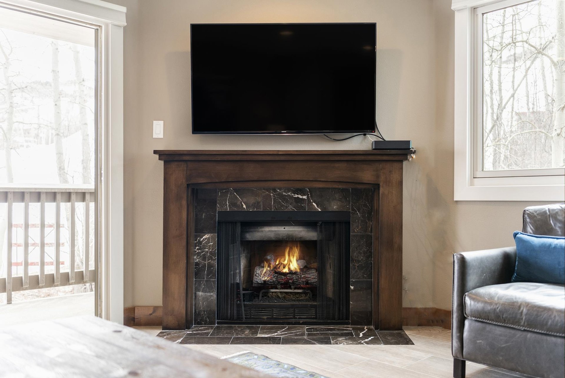 Relax by the cozy fire after a day on the slopes