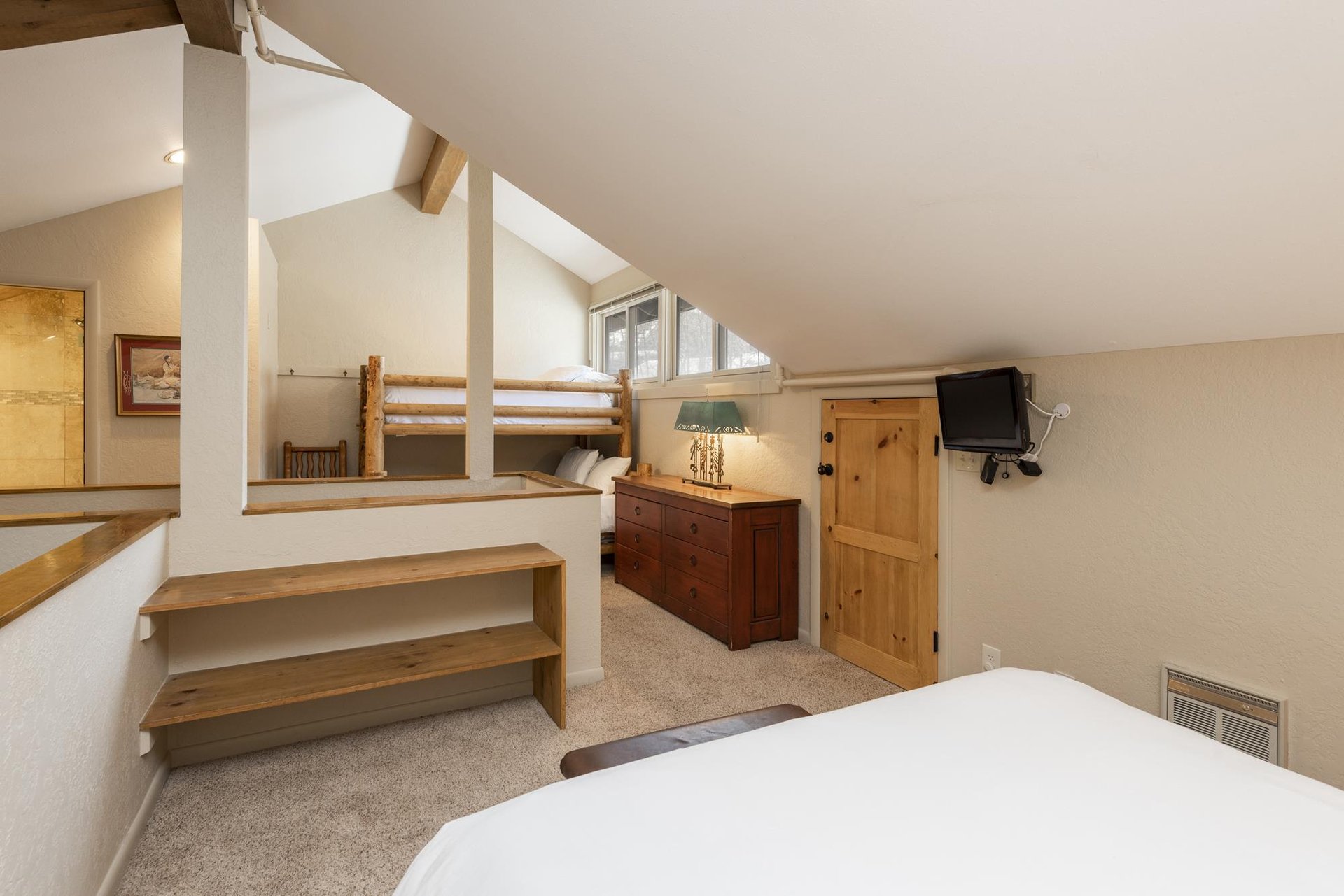Queensized bed in the loft