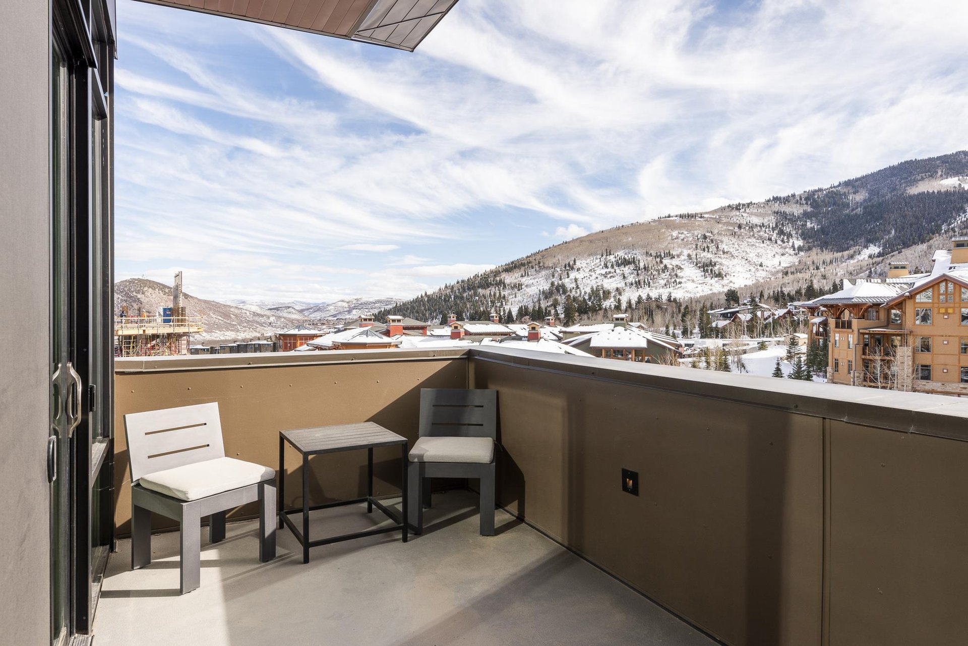 Main bedroom secluded relaxation on the private patio overlooking the mountains