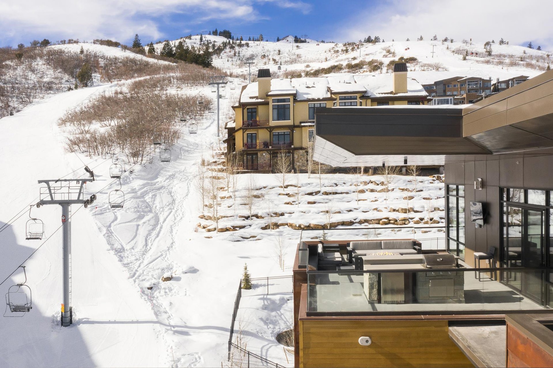 Aerial view of the private patio and ski hill at Lift 601