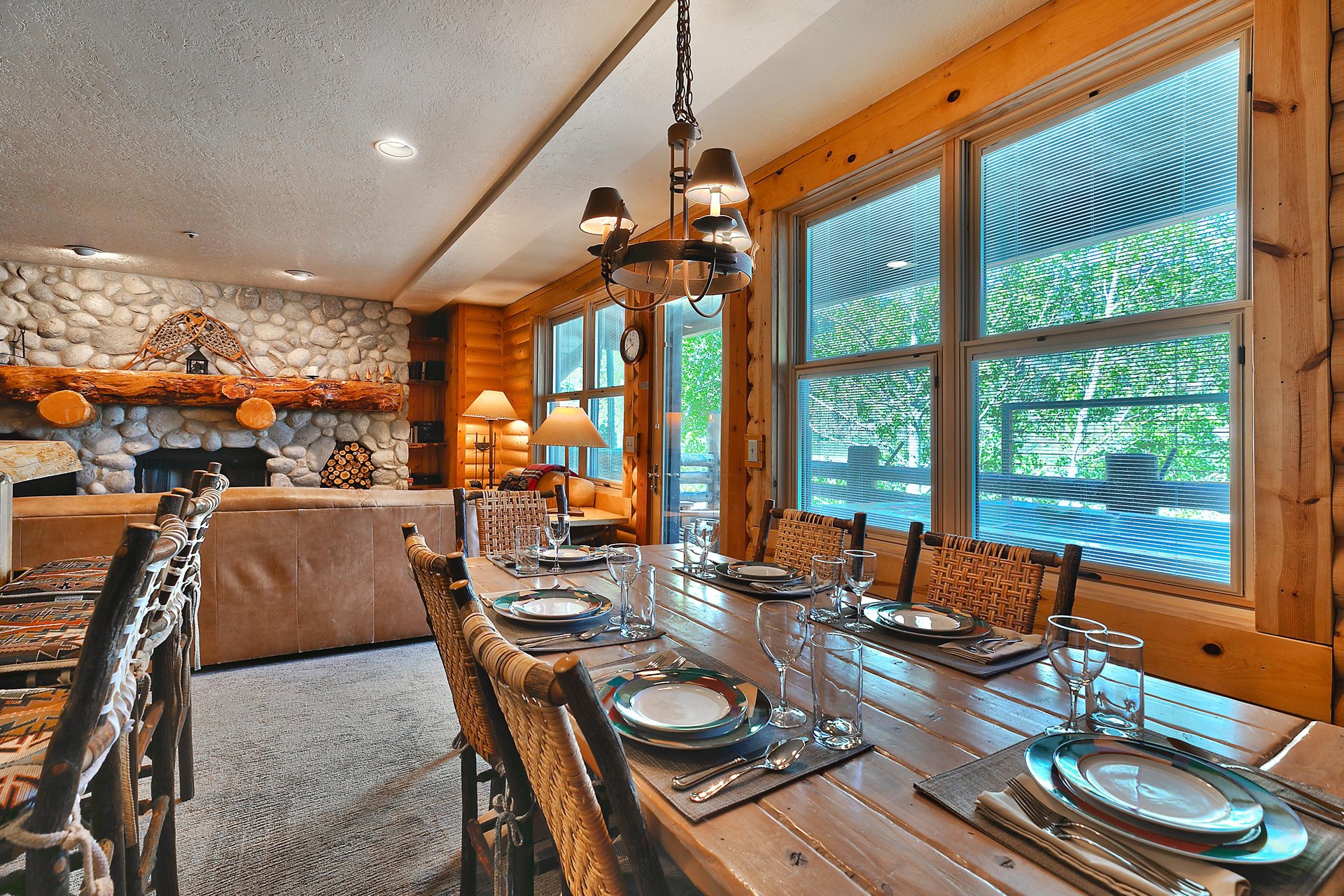 First dining room opening up to the living room with plenty of natural light