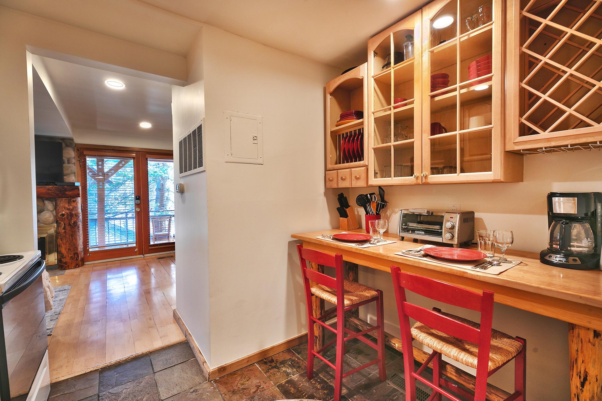 Cozy dining nook with seating for 2 in wooden barstools