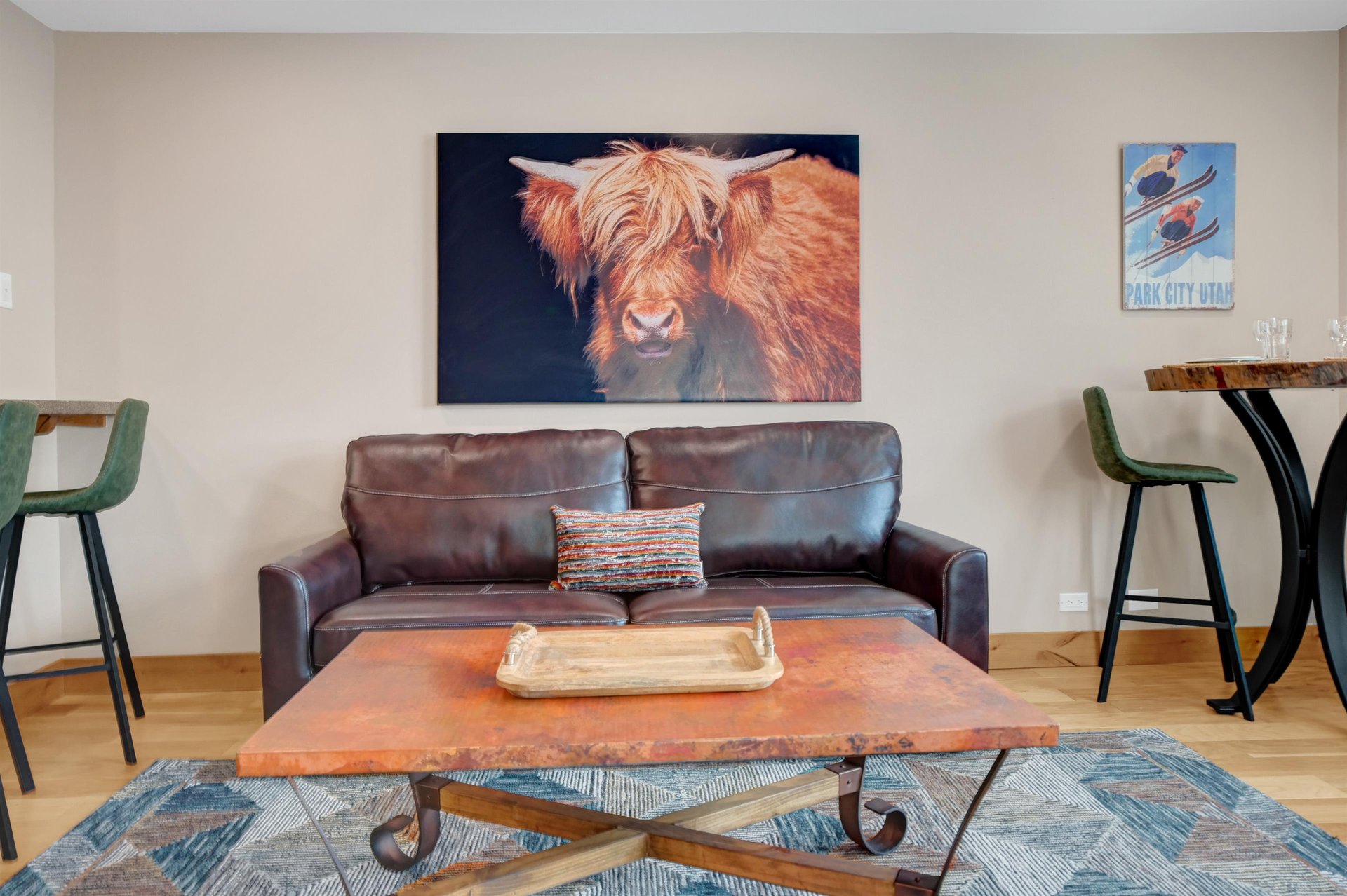 Queen sofa sleeper in the living room, highland cow wall art