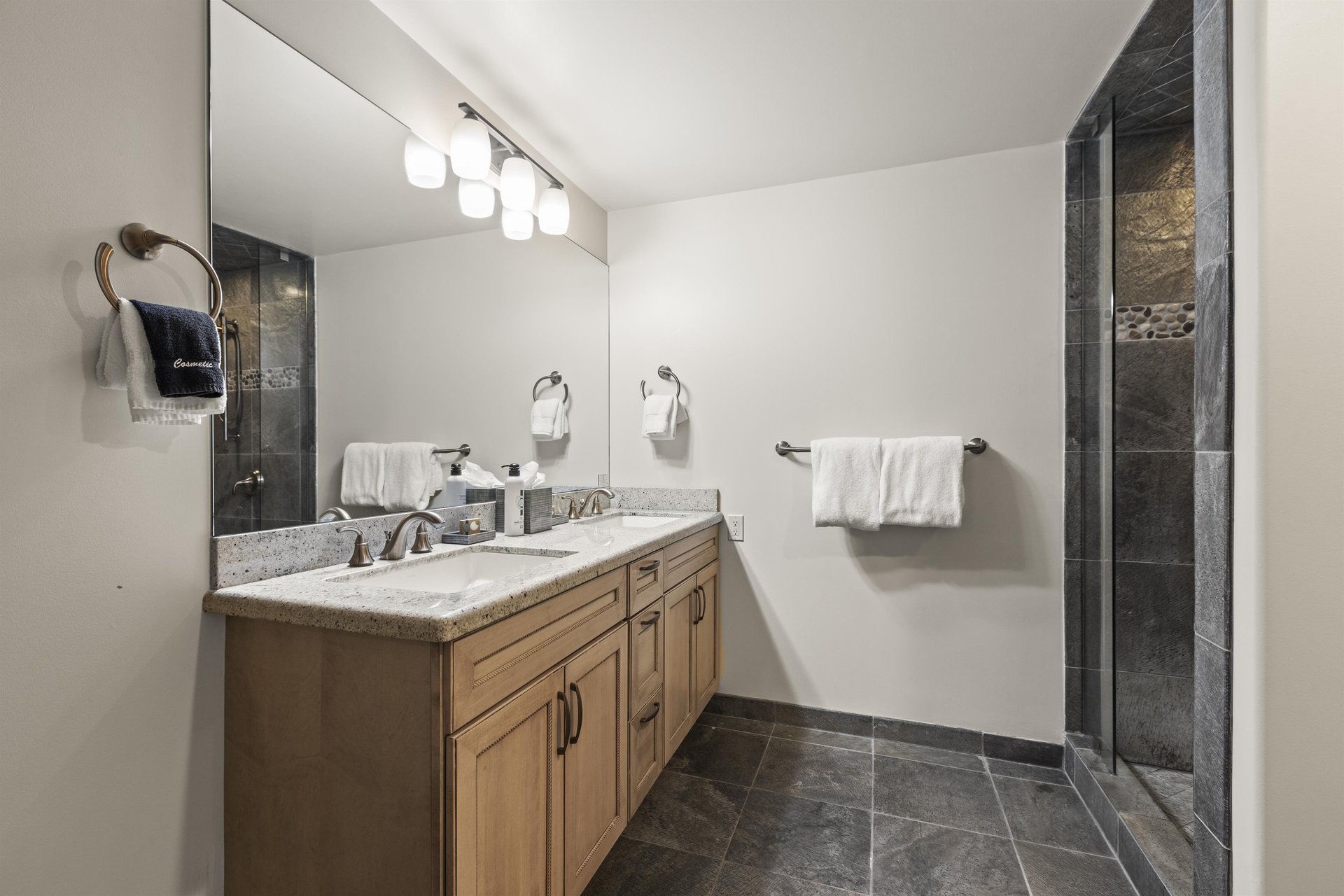 The fourth bedroom has an en suite bathoom with walk in shower.