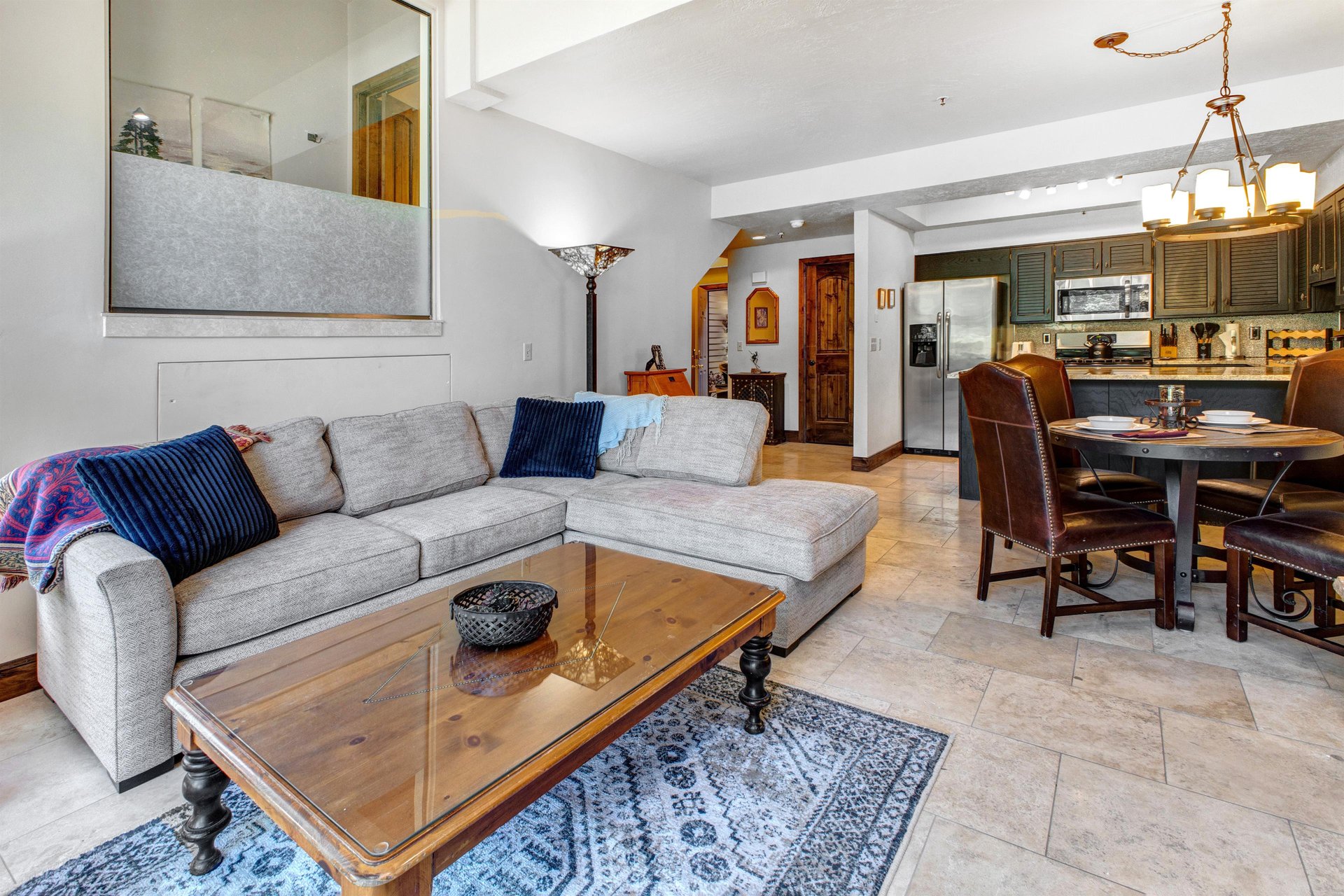 The living rooms open concept living room, dining area, kitchen, and entry way.