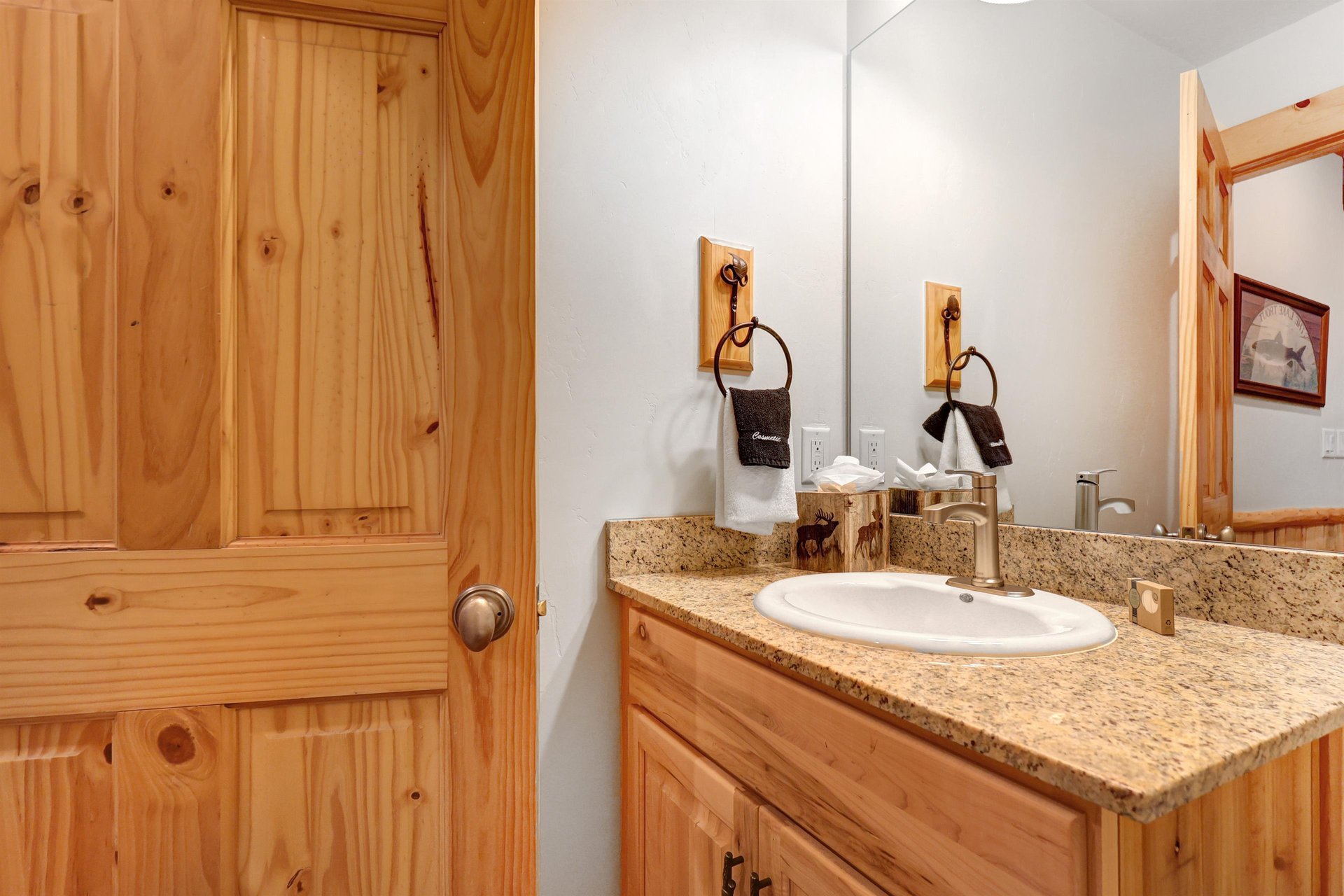 A powder room located next to the main living area.