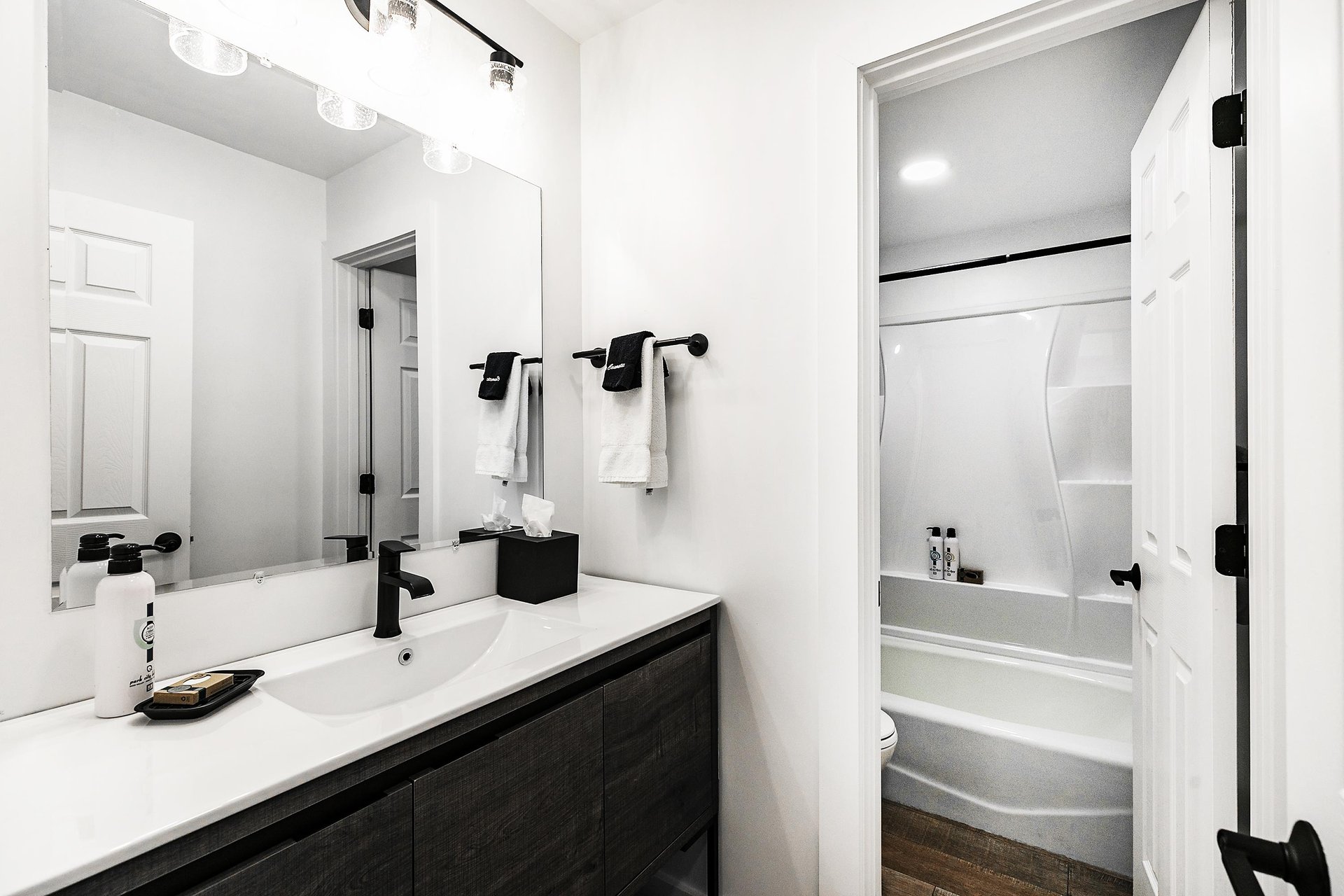 Full bathroom on the main floor with vanity lighting