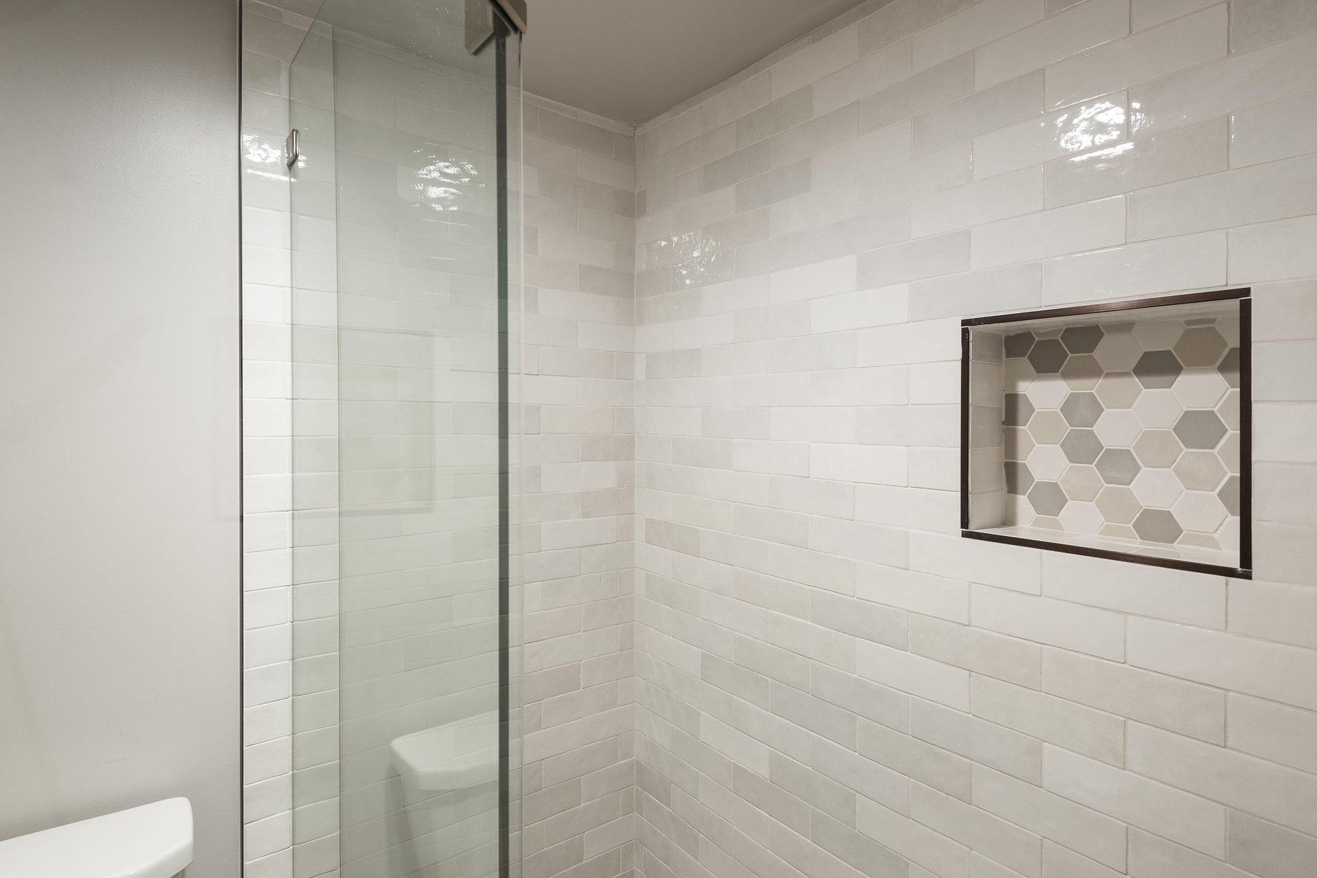 Tiled shower in main bathroom
