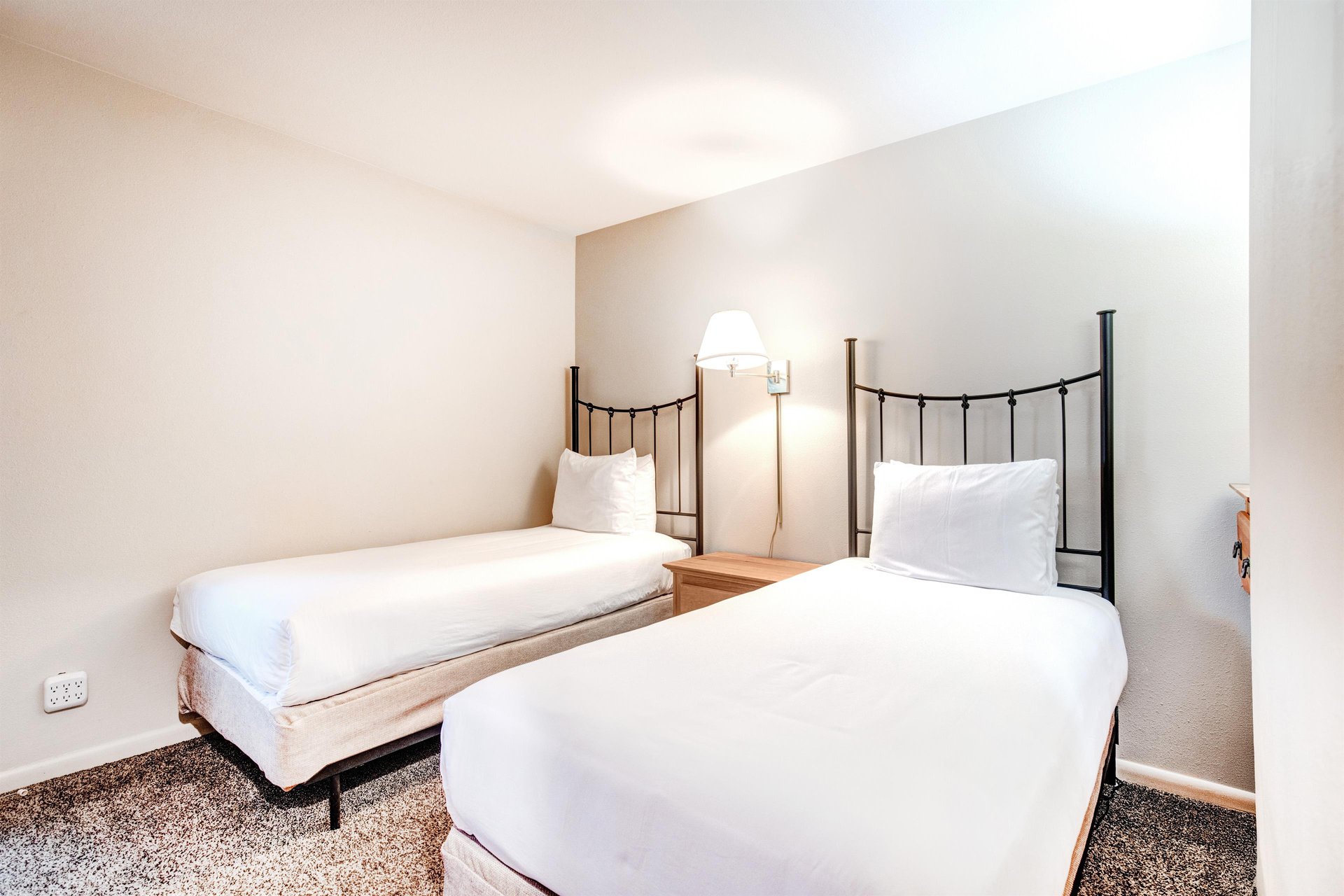 The second bedroom offers two twin size beds.