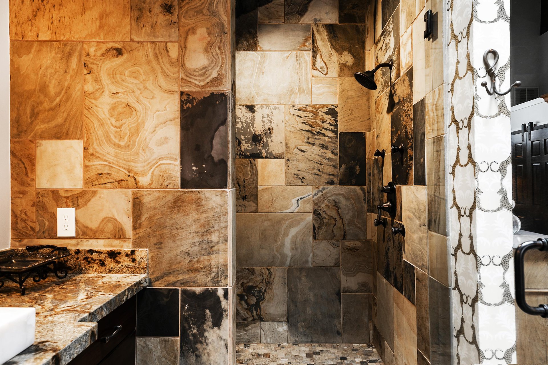 The ensuite private main bathroom offers a walkin tiled shower.