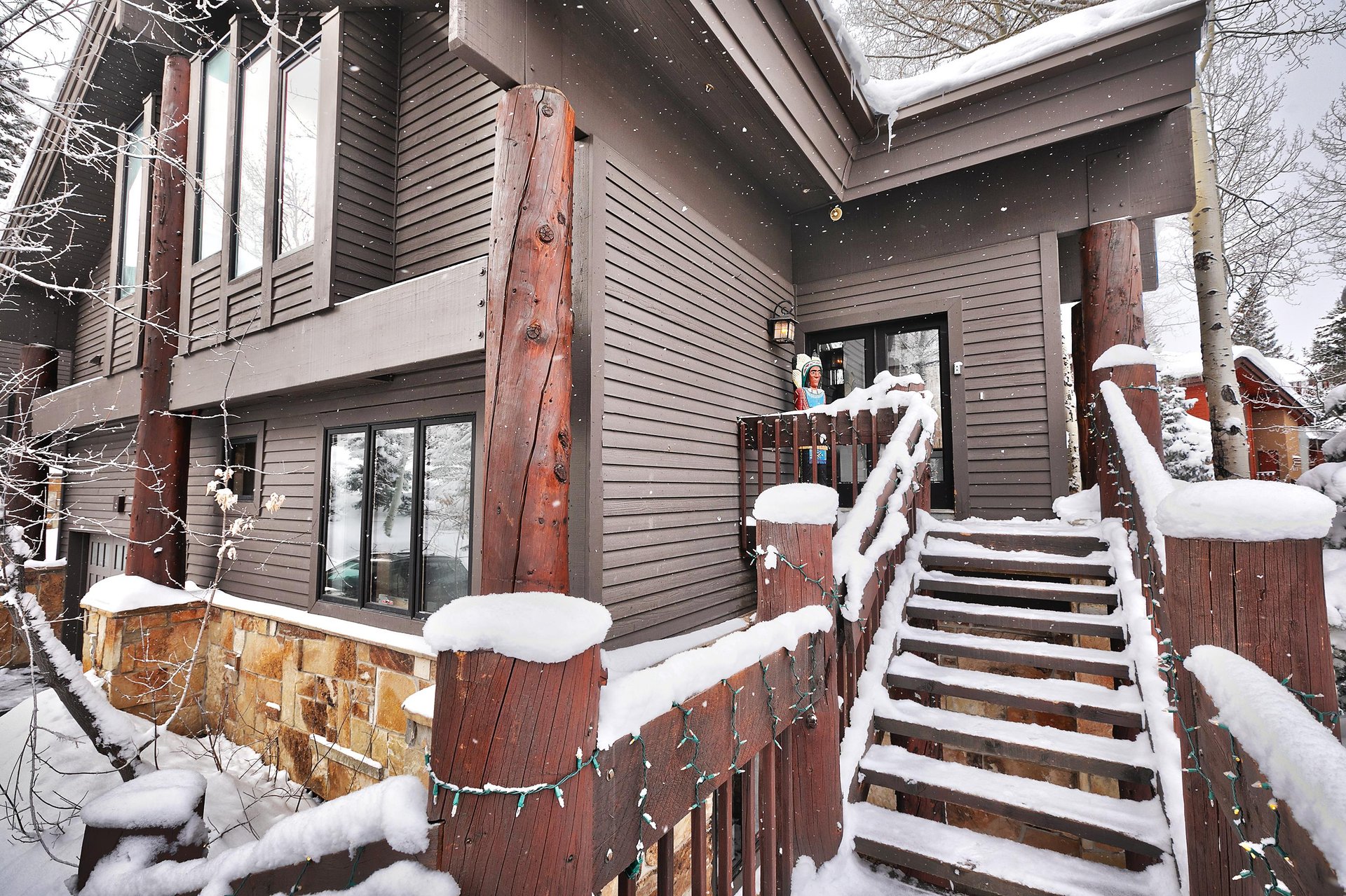 The exterior of Aspen Hollow 6 covered with snow.