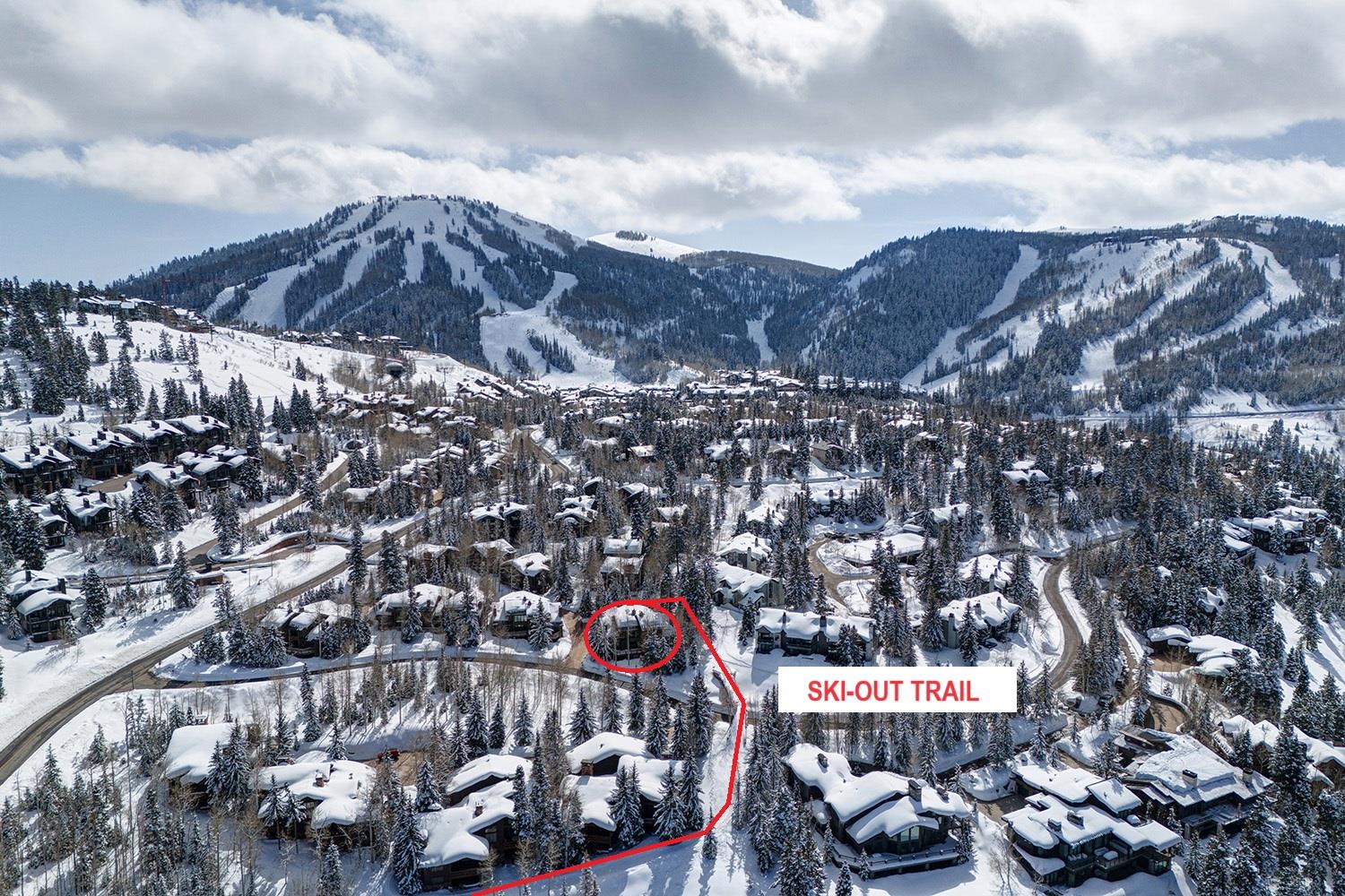 The exterior of Aspen Hollow 6 with a skiout trail to Deer Valley Resort.