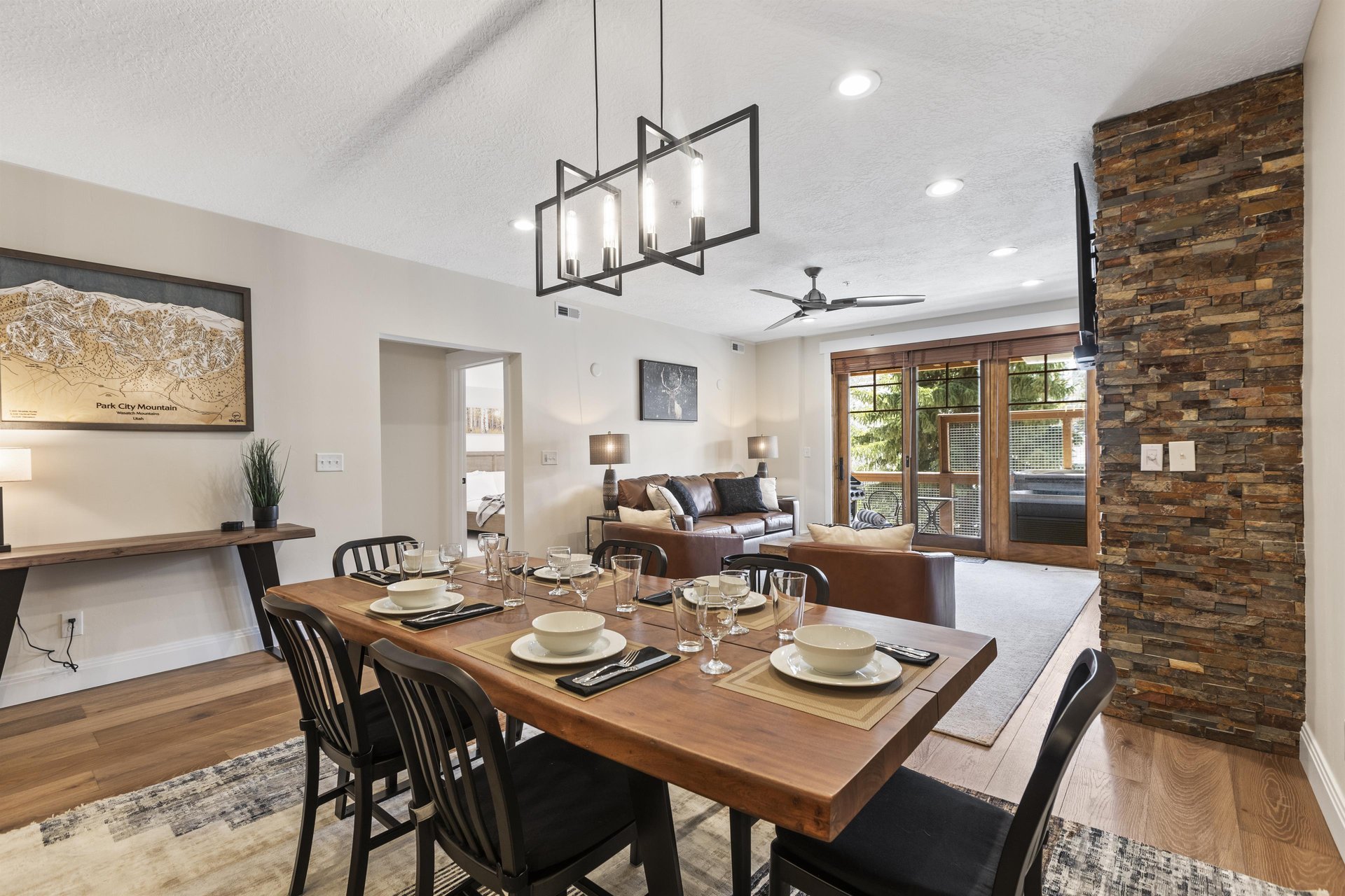 The open concept dining area with seating for 6 and the dining table.